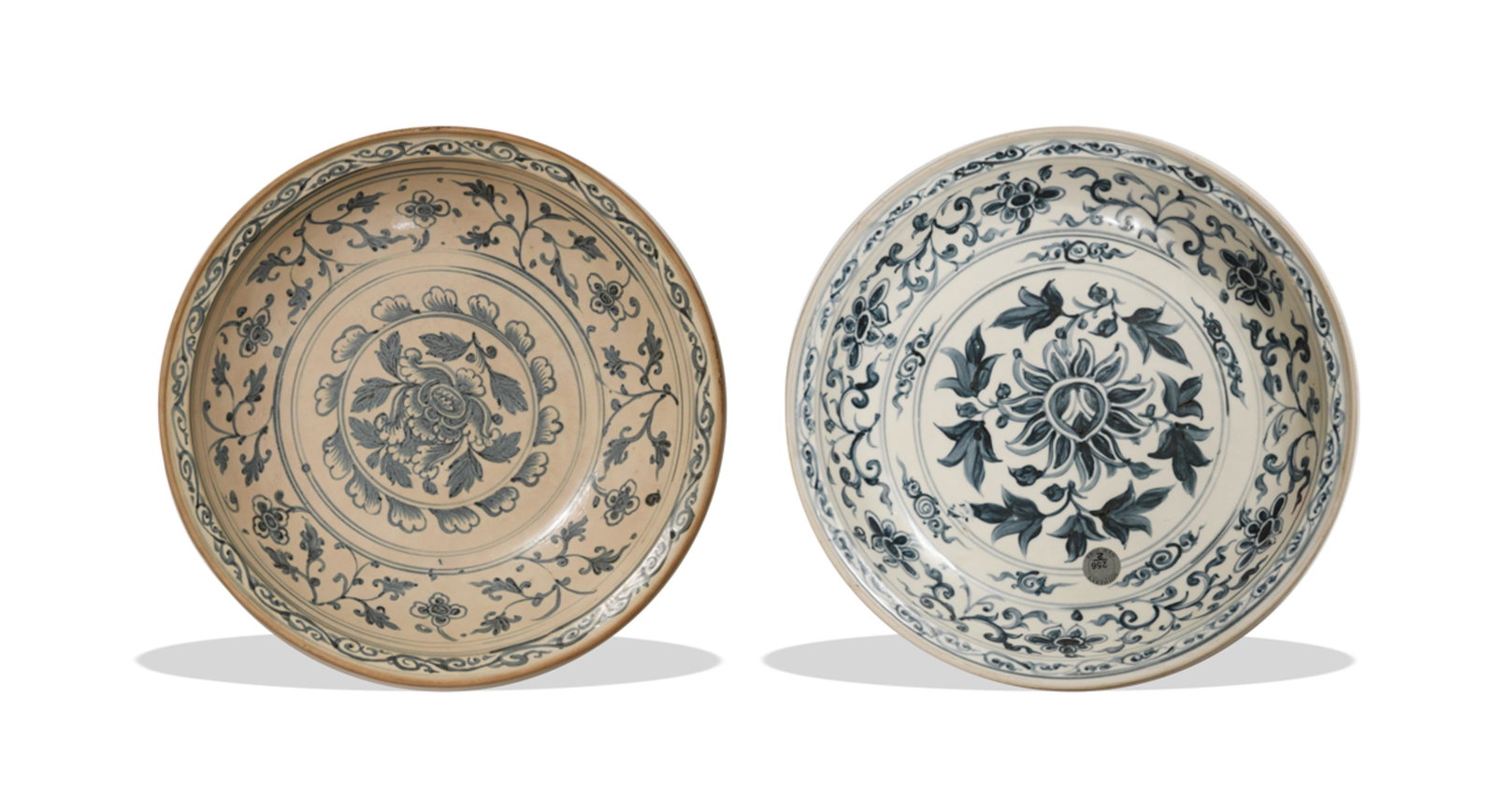 2 Chinese Blue and White Chargers, Ming: A group of two Chinese blue and white chargers dating from the Ming dynasty. Both are decorated with lotuses on the interior and lotus petals on the exterior. Dimensions are: 3 inches tall X 14 1/2 in