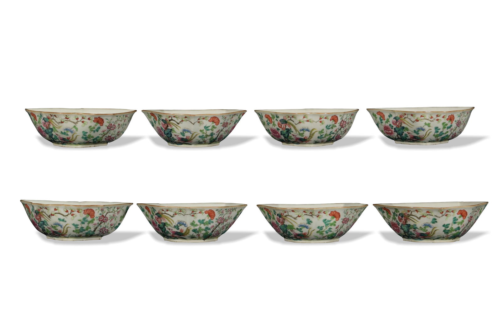 Chinese Famille Rose Sectionals, 19th Century: Two sets of 4 Chinese famille rose porcelain sectional dishes dating from the 19th century. The sectionals feature a goldfish in the interior while the exterior depicts a pair of pheasants in a landsc
