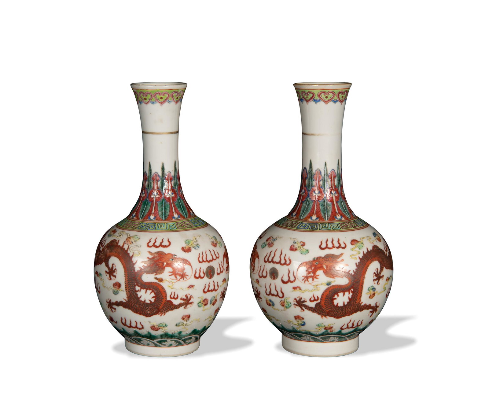 Pair of Chinese Famille Rose Dragon Vases, Guangxu: A pair of Chinese famille rose vases with 6-character marks of Guangxu and of the period. Both white-ground vases feature a pair of dragons chasing flaming pearls. The neck of each vase has a stylized