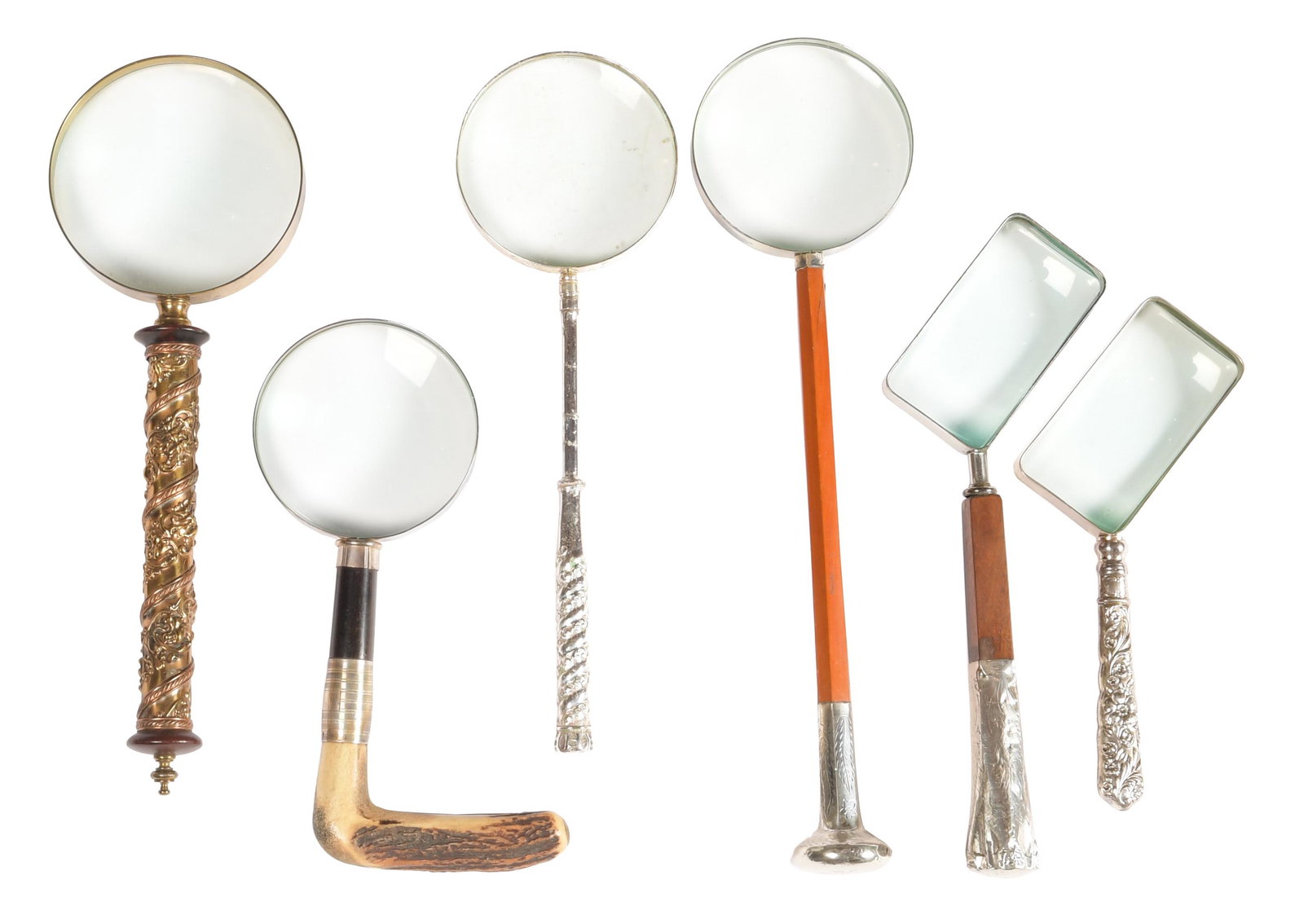 6 Vintage Magnifying Glasses, Sterling, Wood: A lot of six vintage magnifying glasses, some with handles made from parasols and walking sticks. Includes two with sterling ends on wood handles; one with floral sterling handle; one with antler, ste