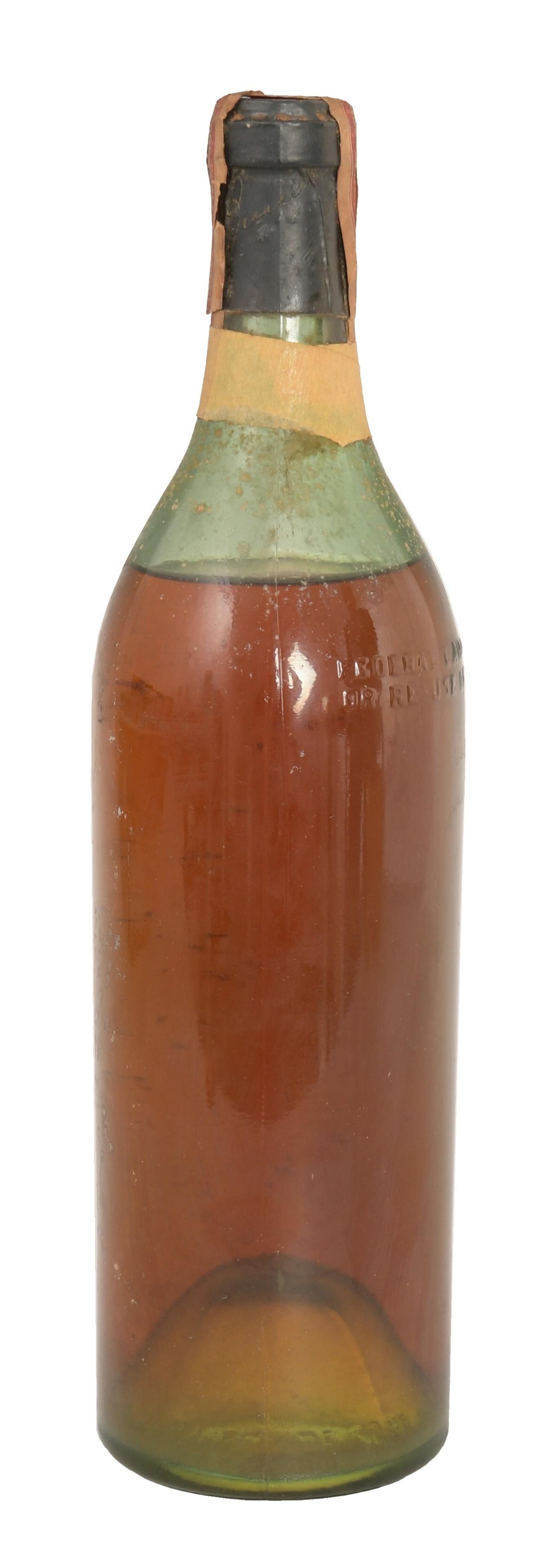 Sealed Bottle Bacardi Gold Cuban Rum C-1935: A sealed bottle of 1920's - 30's Bacardi Cuban Carta de Oro rum. The bottle is missing the original label but has the intact Bacardi seal and pre series Federal tax stamp. Please note: Due to Virginia