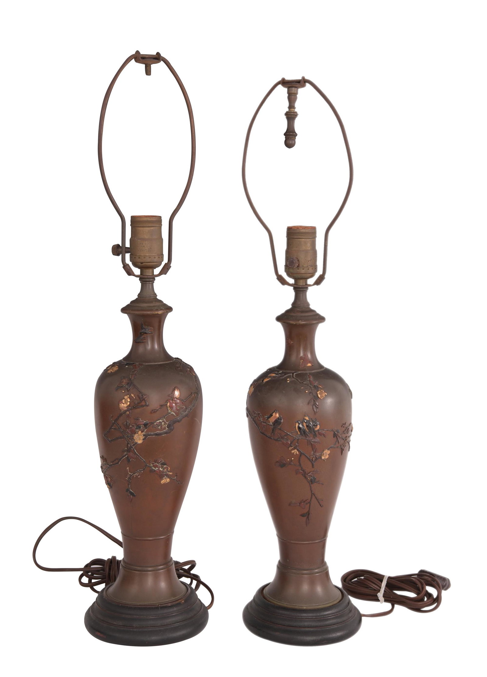 Pr. of Japanese Mixed Metal Bronze Lamps, Meiji: A pair of Japanese bronze vases from the Meiji era that have been mounted as lamps. The vases feature bronze, gold, copper and shakudo birds and cherry blossoms. Dimensions are: 23 inches tall X 3 1/2
