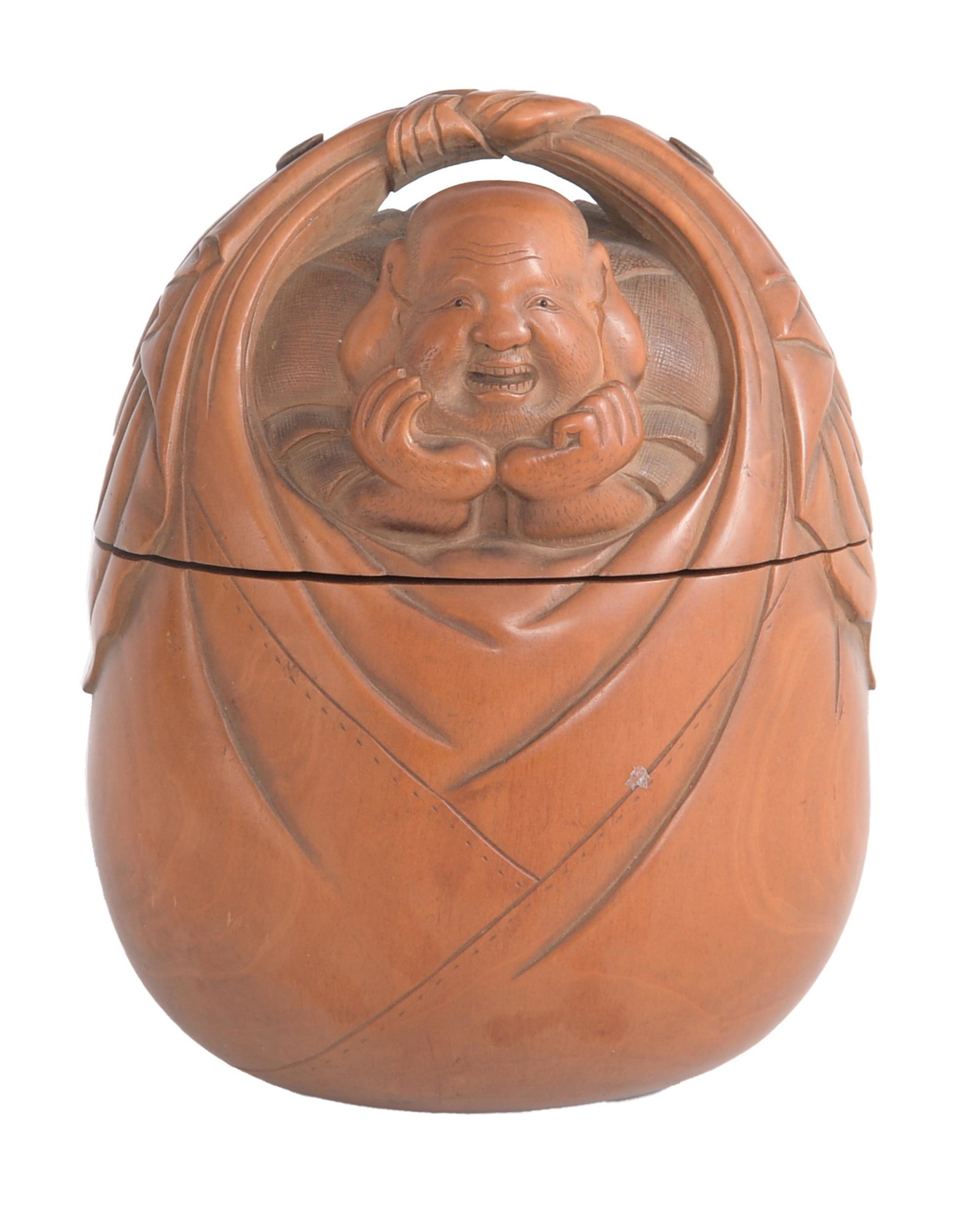 Japanese Carved Boxwood Tobacco Box, Meiji: A Japanese carved boxwood Tonkotsu or tobacco box dating between the late Edo or early Meiji period. The pouch is carved in the form of Hotei and signed on the inside of the lid either Chuichi or Tada