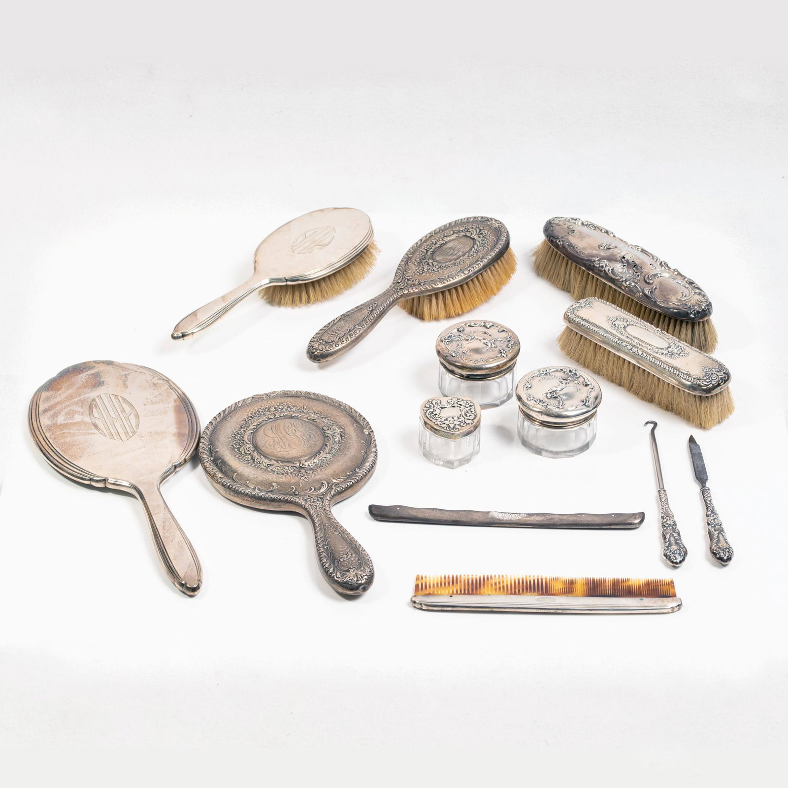 Two sets of Gorham dresser mirrors, brushes and comb. Gorham button hook and file. Mauser brush and (1 of 6)