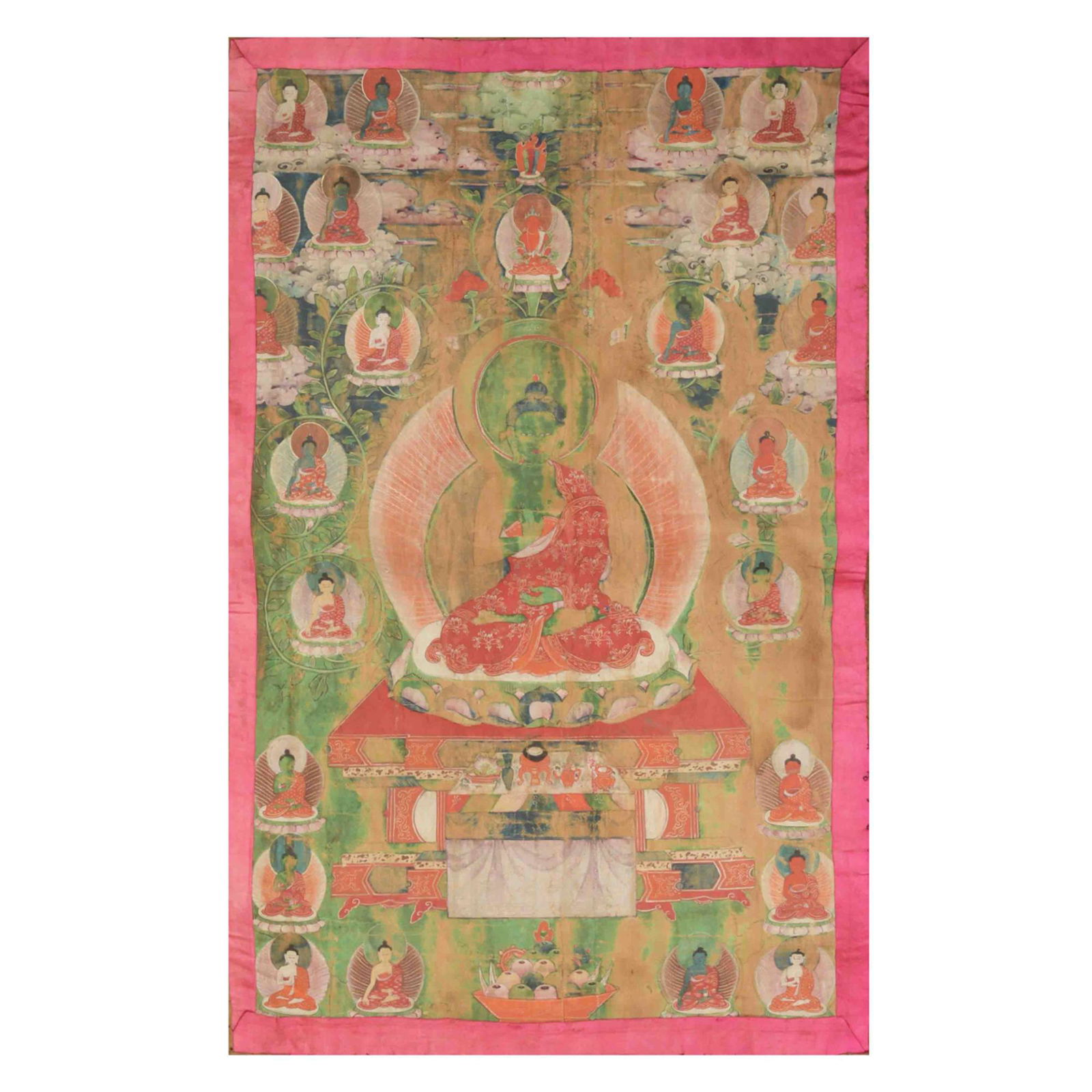 A paint on cloth thangka of green Amoghasiddhi Buddha dating from the 17th or 18th century. He sits (1 of 7)