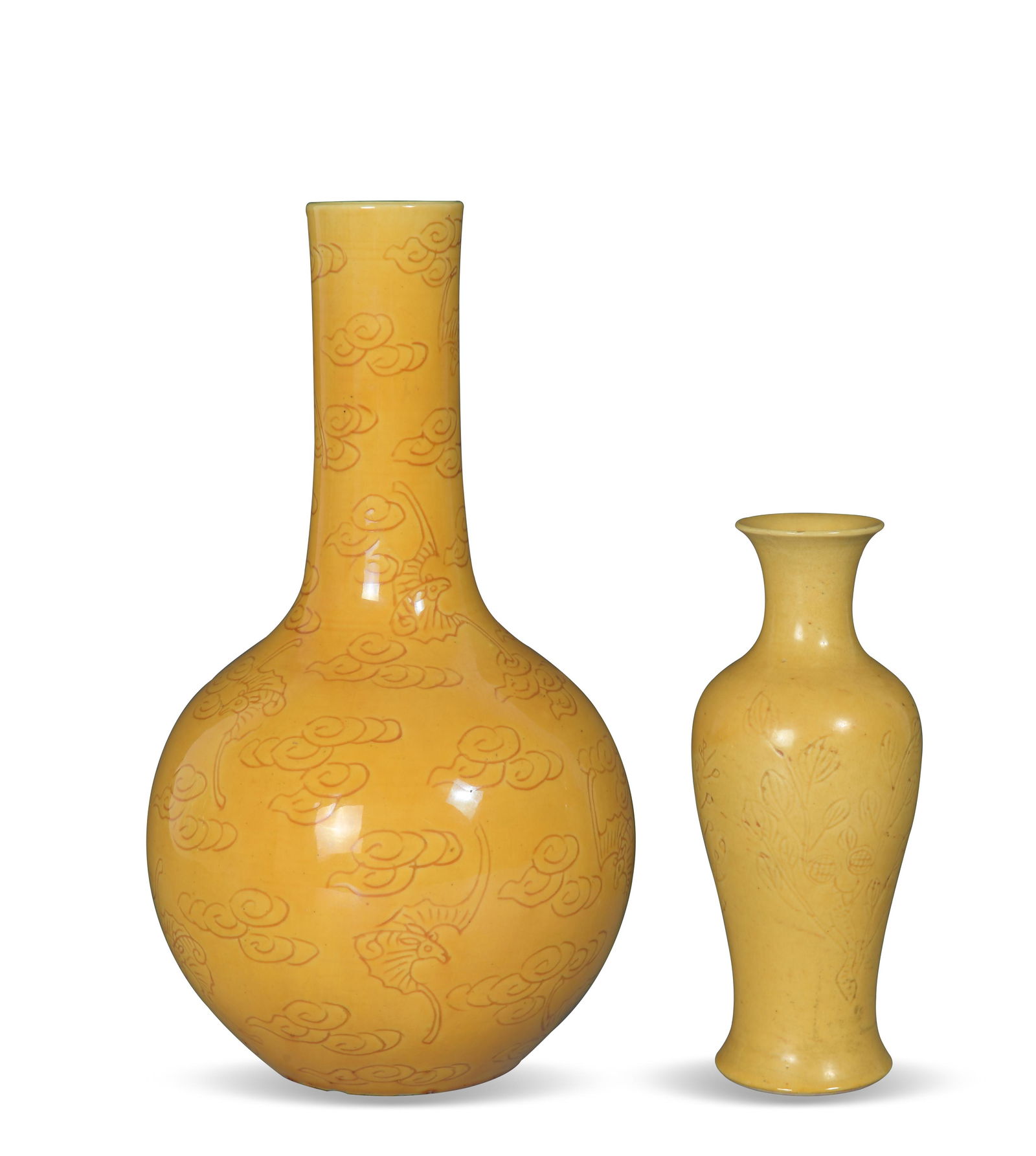2 Chinese Incised Yellow Glazed Vases, 19th Century: Two Chinese incised yellow glazed vases dating from the 19th century. One tianqiu vase features bats flying among ruyi clouds, the other vase depicts 3 flowering boughs. Dimensions are: 9 inches tall