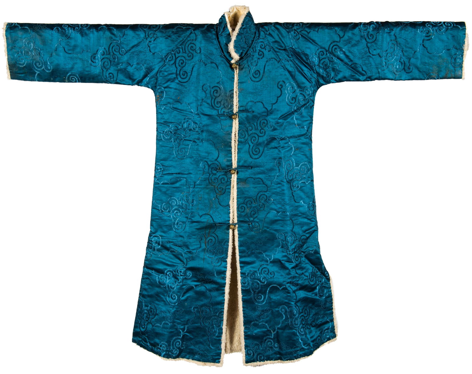 A Chinese child's blue silk winter robe, Republic period: A Chinese child's blue silk winter robe Republic period H: 44, W: 34 in. H: 111.8, W: 86.4 cm. (all measurements are approximate) Provenance: Mrs. Curion, Northern California. Condition: Minor stainin