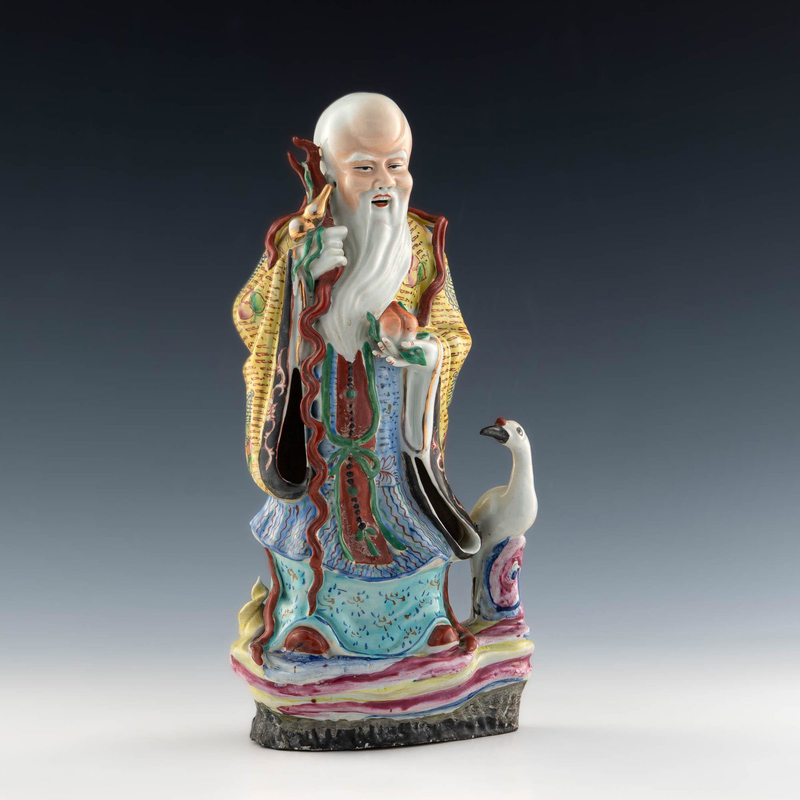 A Chinese famille rose statuette of Shou with a crane, Republic period: A Chinese famille rose statuette of Shou with a crane Republic period H: 13 3/4, W: 6 1/4, D: 4 in. H: 34.93, W: 15.88, D: 10.16 cm. All measurments are approximate. Provenance: Private collection, Ne