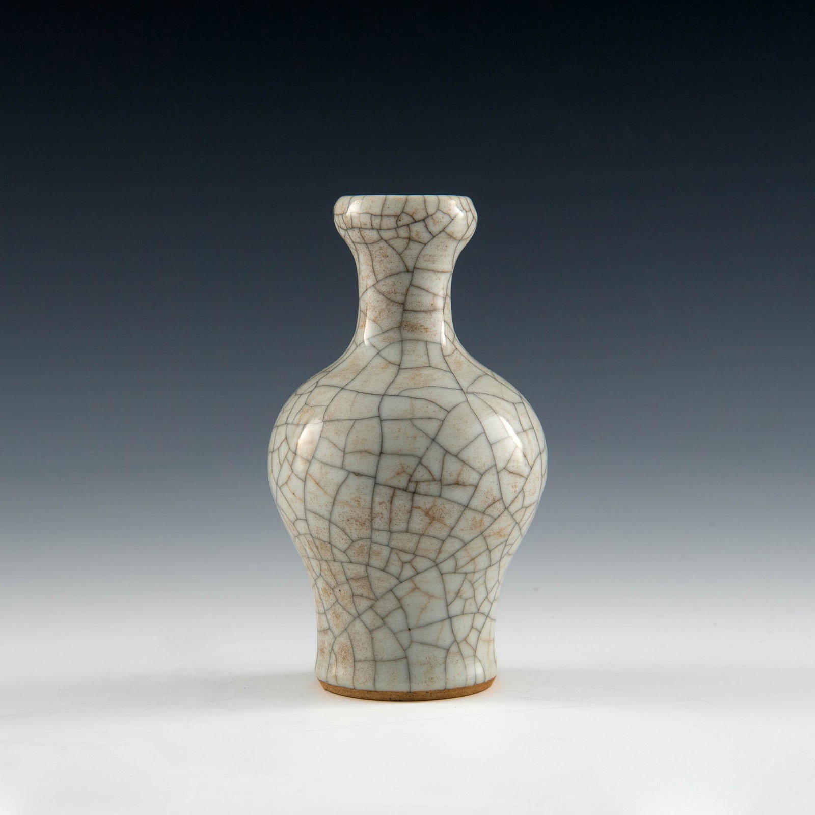 A Chinese ge-glazed garlic-headed vase, 18th century: A Chinese ge-glazed garlic-headed vase 18th century H: 6 1/2, Dia: 3 3/4 in. H: 16.51, Dia: 9.53 cm. All measurments are approximate. Provenance: Mr. Wong, Honolulu, Hawaii. Acquired in Hong Kong in t