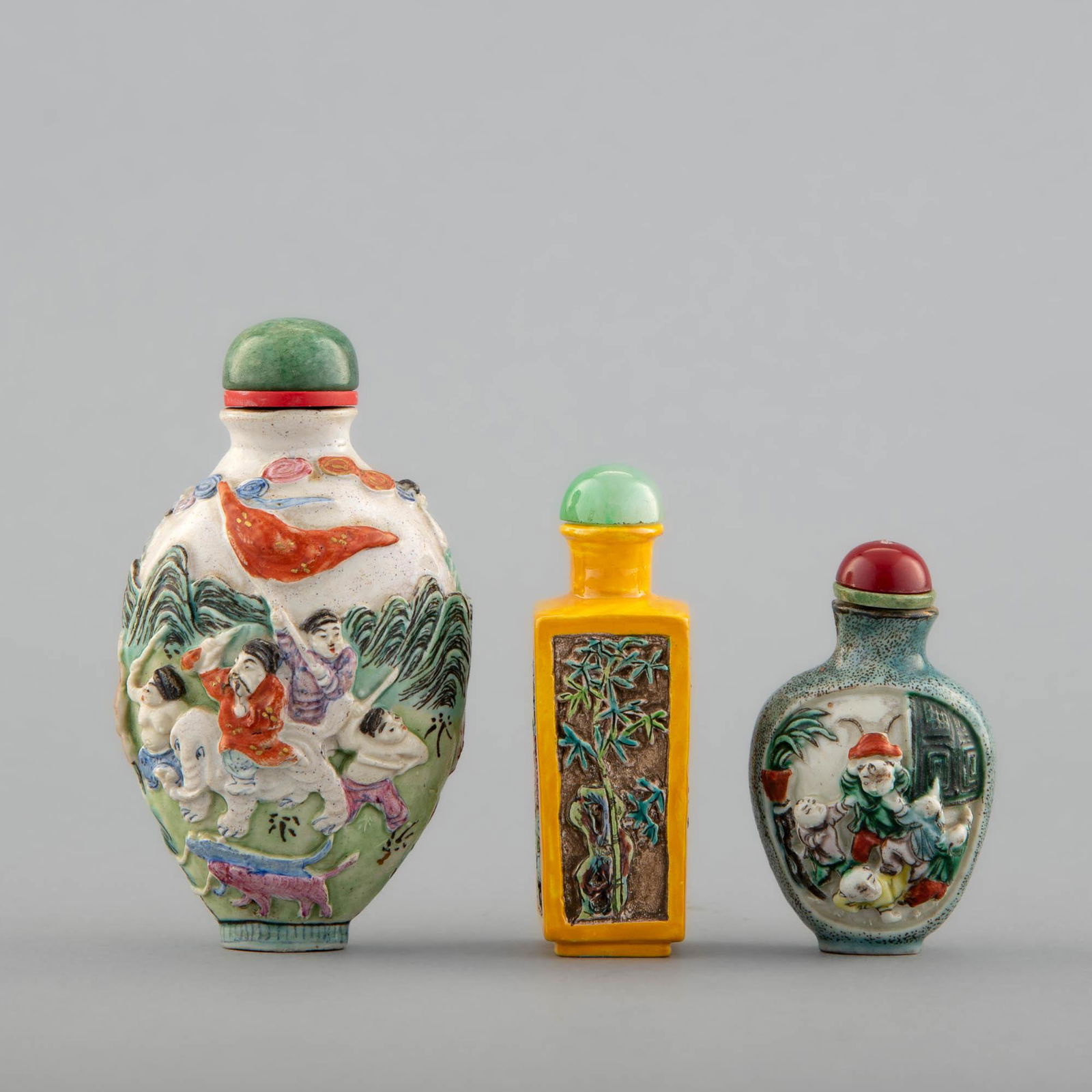 Three Chinese carved porcelain snuff bottles, 19th century (1 of 9)