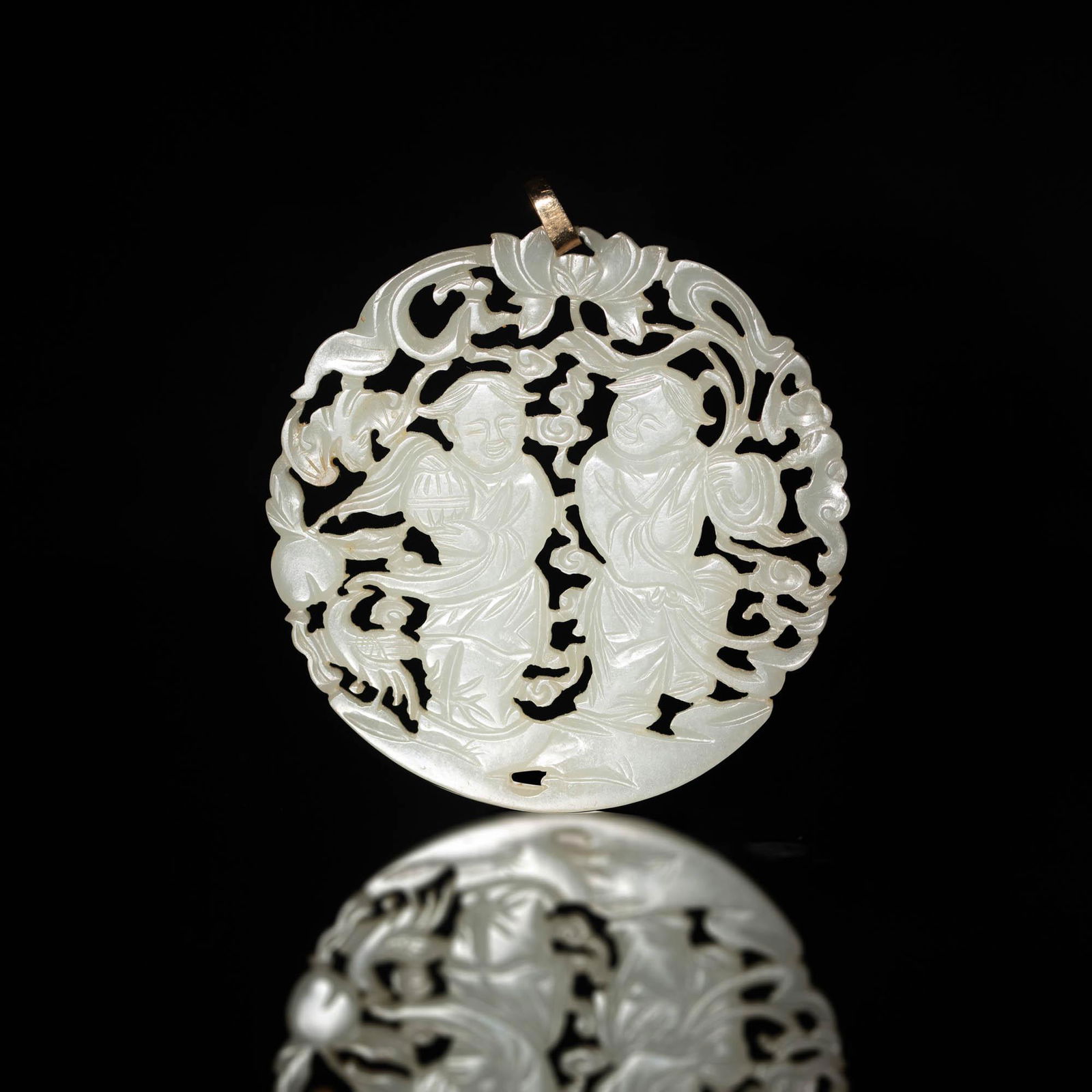 A Chinese white jade plaque carved with Hehe Erxian, 19th century (1 of 3)