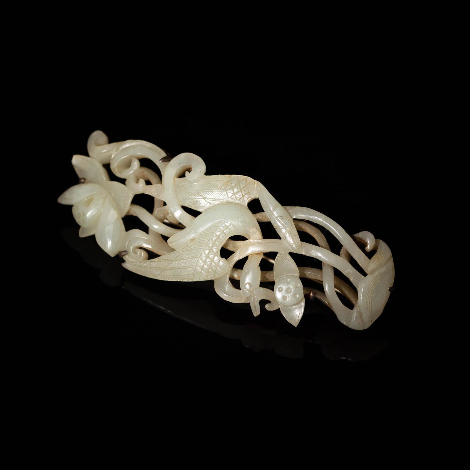 A Chinese white jade plaque carved with a duck, Yuan dynasty (1 of 4)