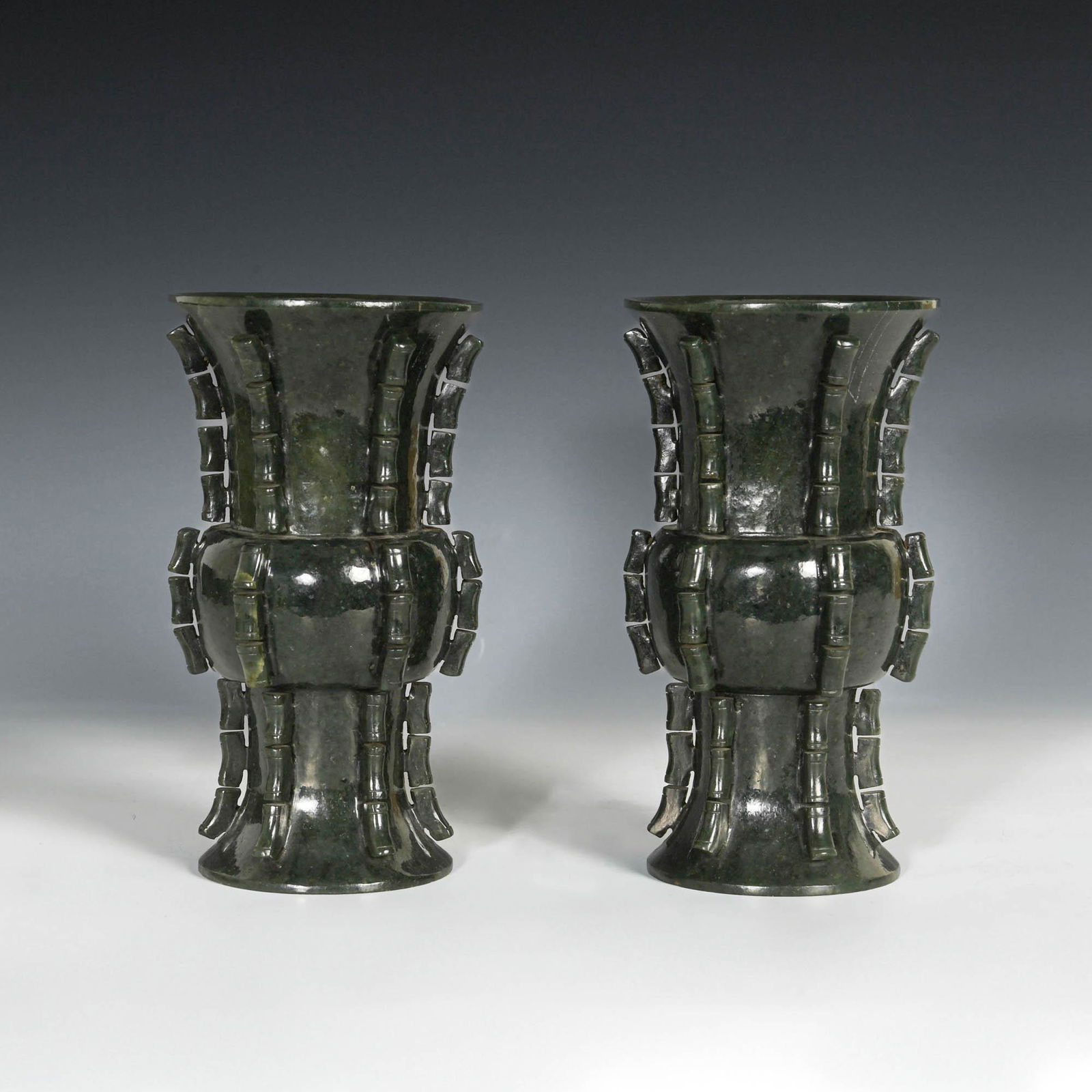 A pair of Chinese spinach jade carved Gu vases, 19th century (1 of 7)