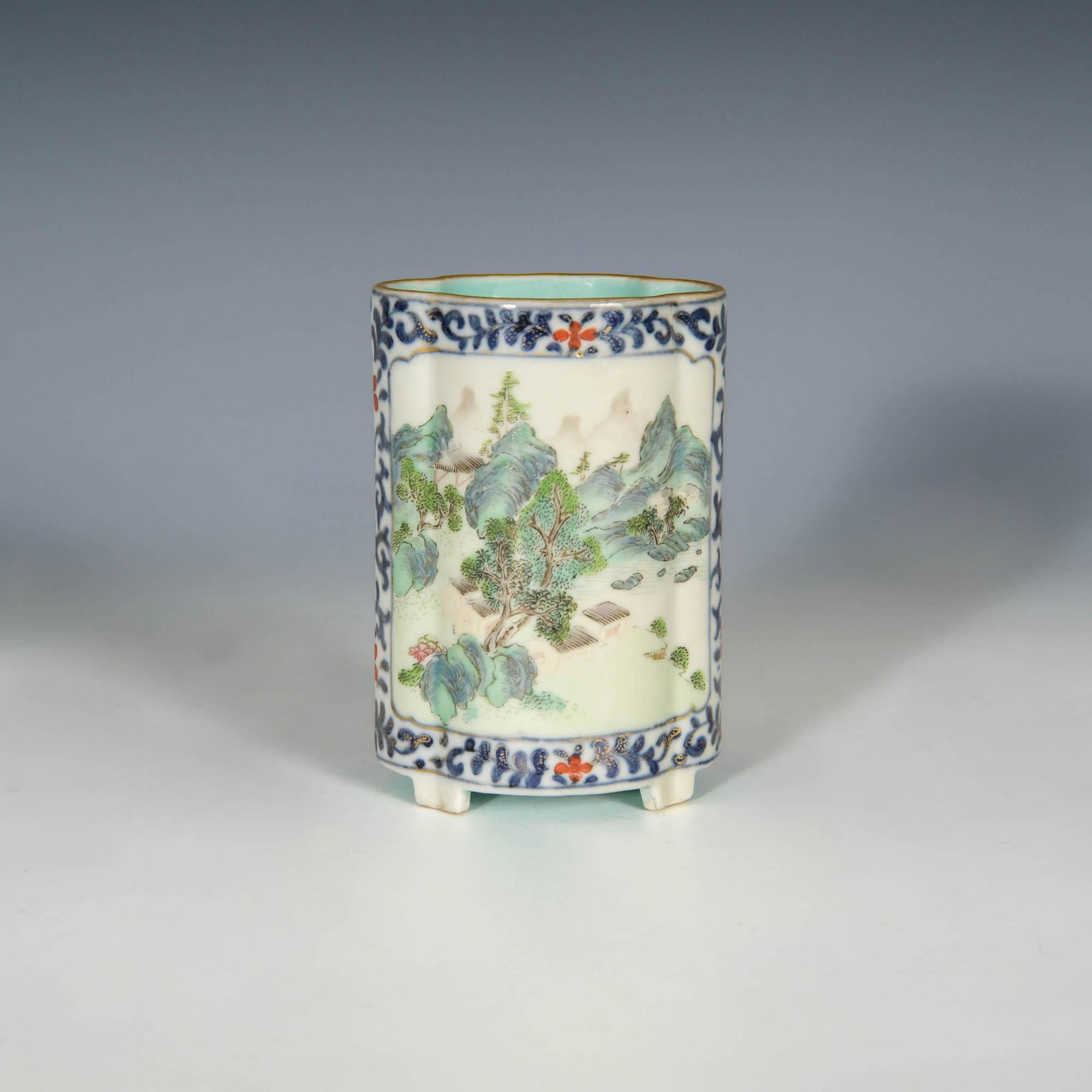 A Chinese blue and white famille rose brush pot, Qianlong period: A Chinese blue and white famille rose brush pot Qianlong period With four-character mark to underside. H: 3 3/8, W: 2 1/4, D: 2 in. (H: 8.57, W: 5.72, D: 5.08 cm.) Provenance: Private collection, New 