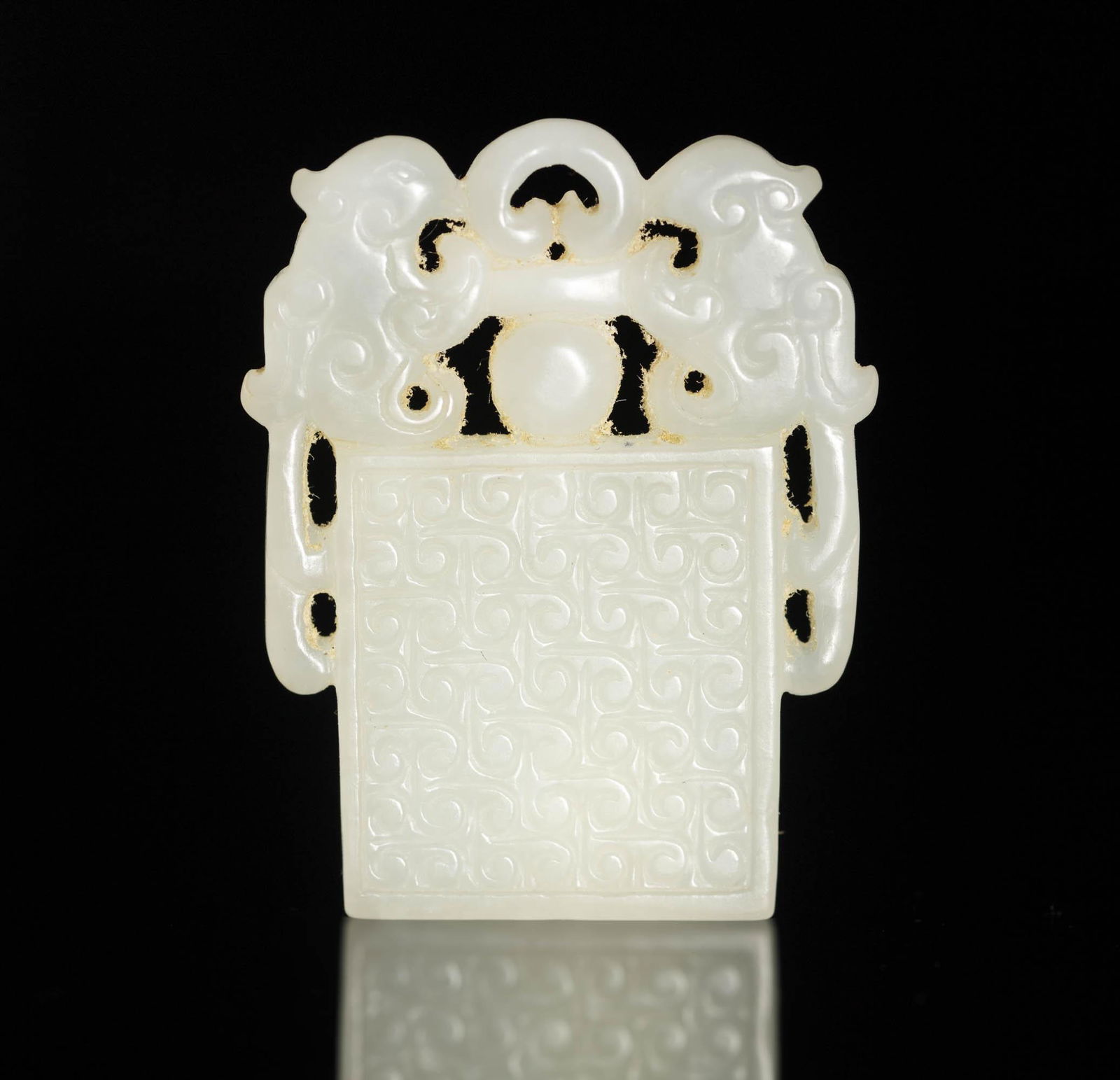 A Chinese white jade plaque, 19th century (1 of 3)