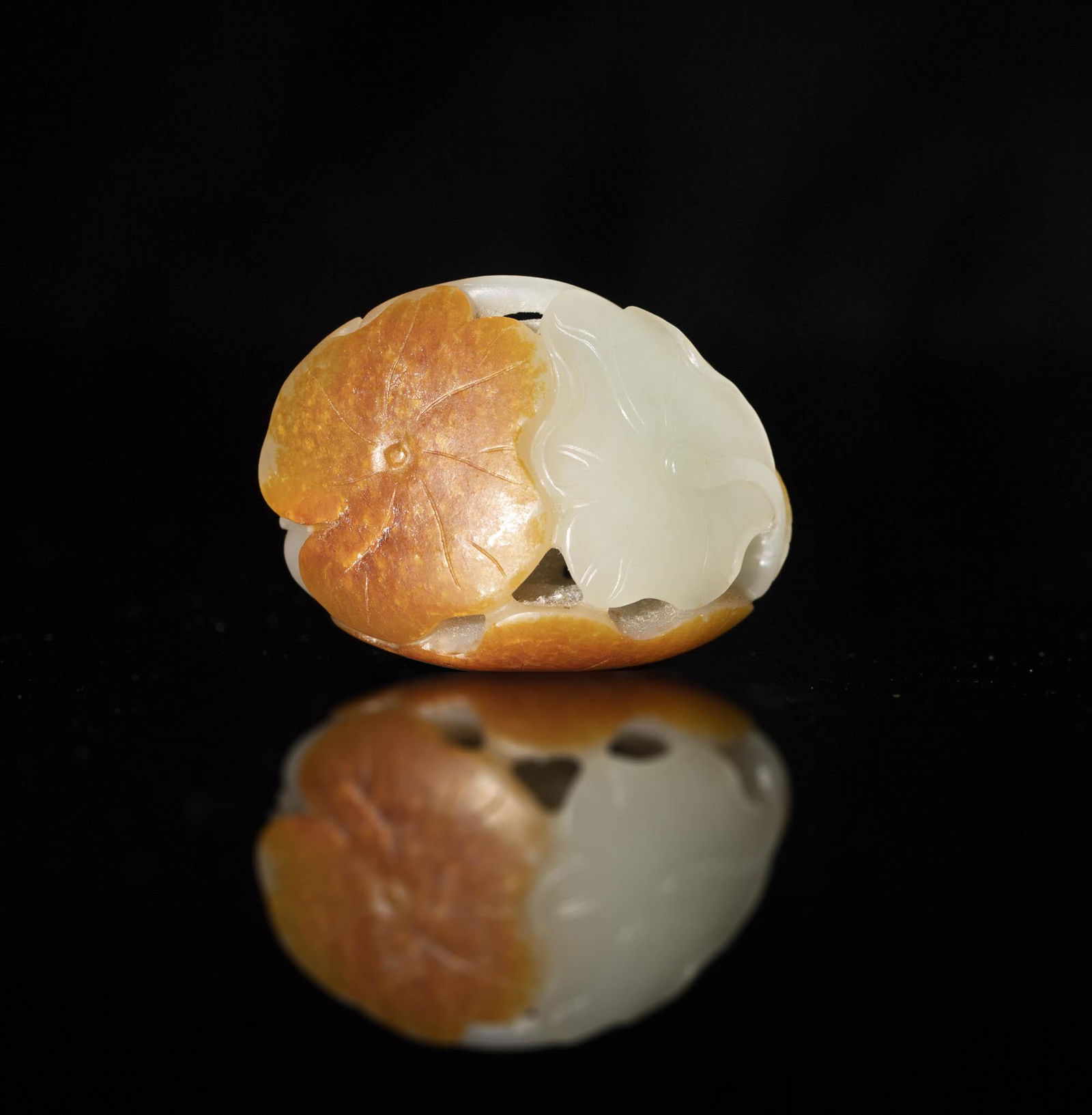 A Chinese white jade lotus leaf pendant, 19th century (1 of 6)