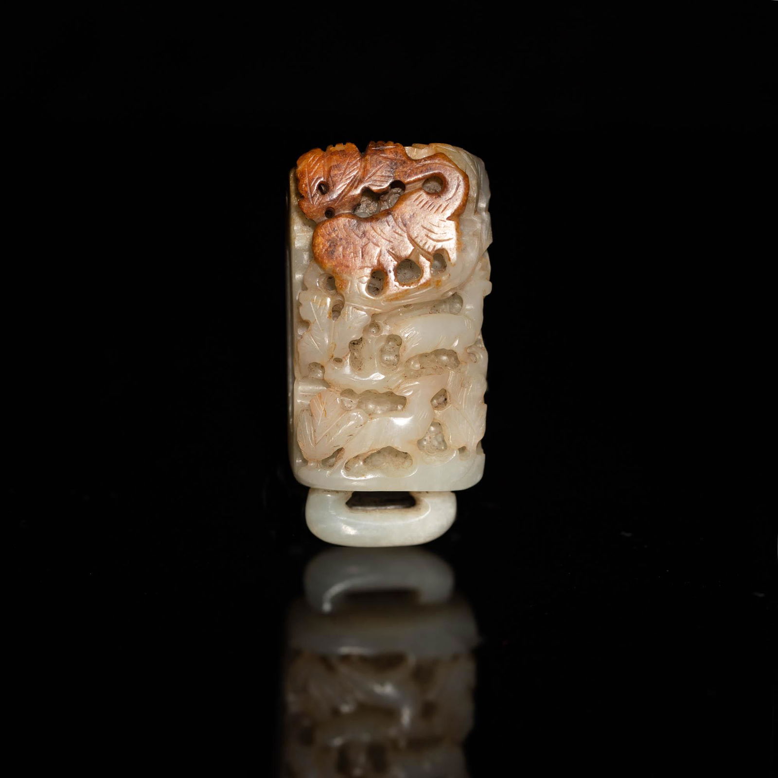 A Chinese carved jade buckle, Ming dynasty or earlier (1 of 6)