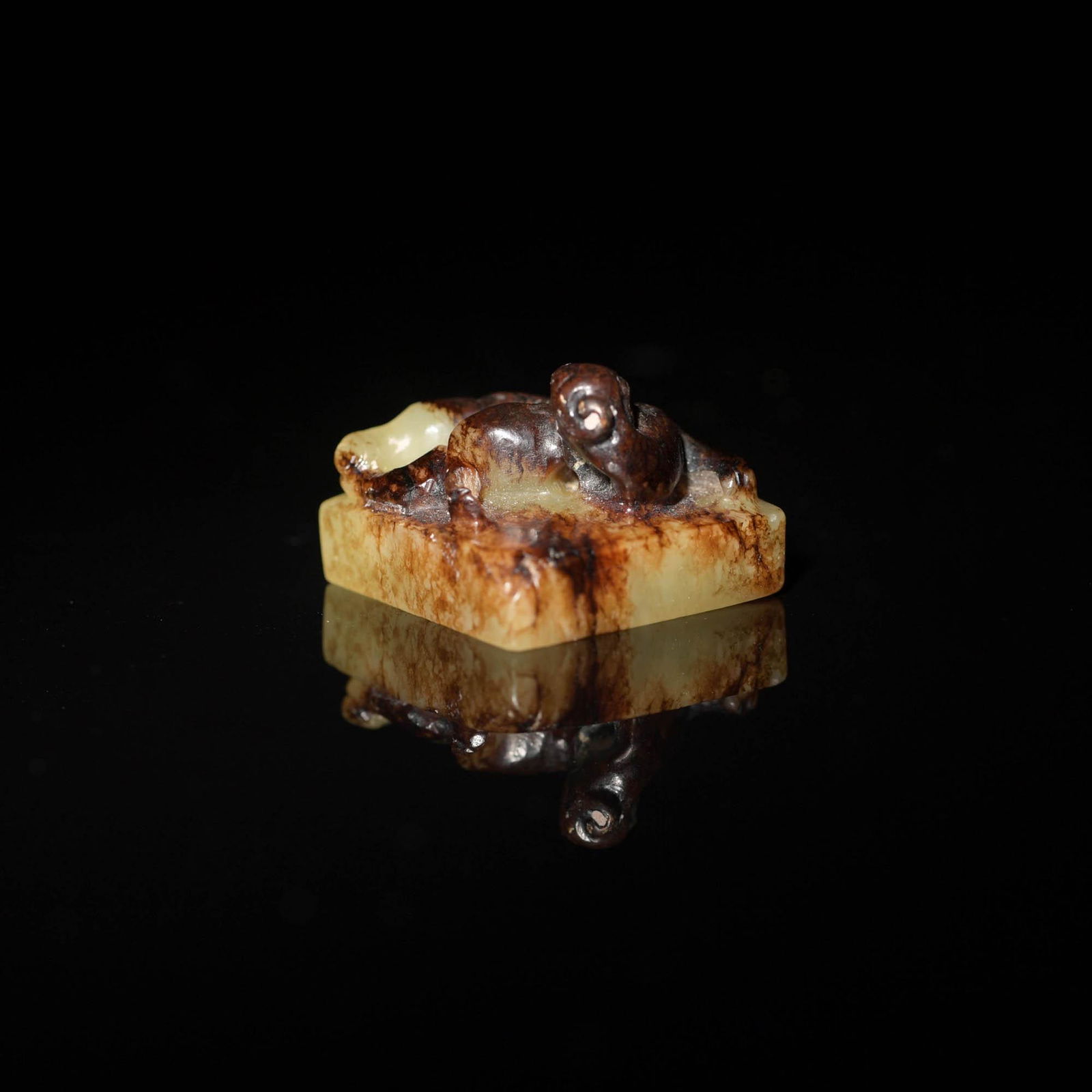 A Chinese yellow jade seal with chilong finial, Ming dynasty or earlier (1 of 7)