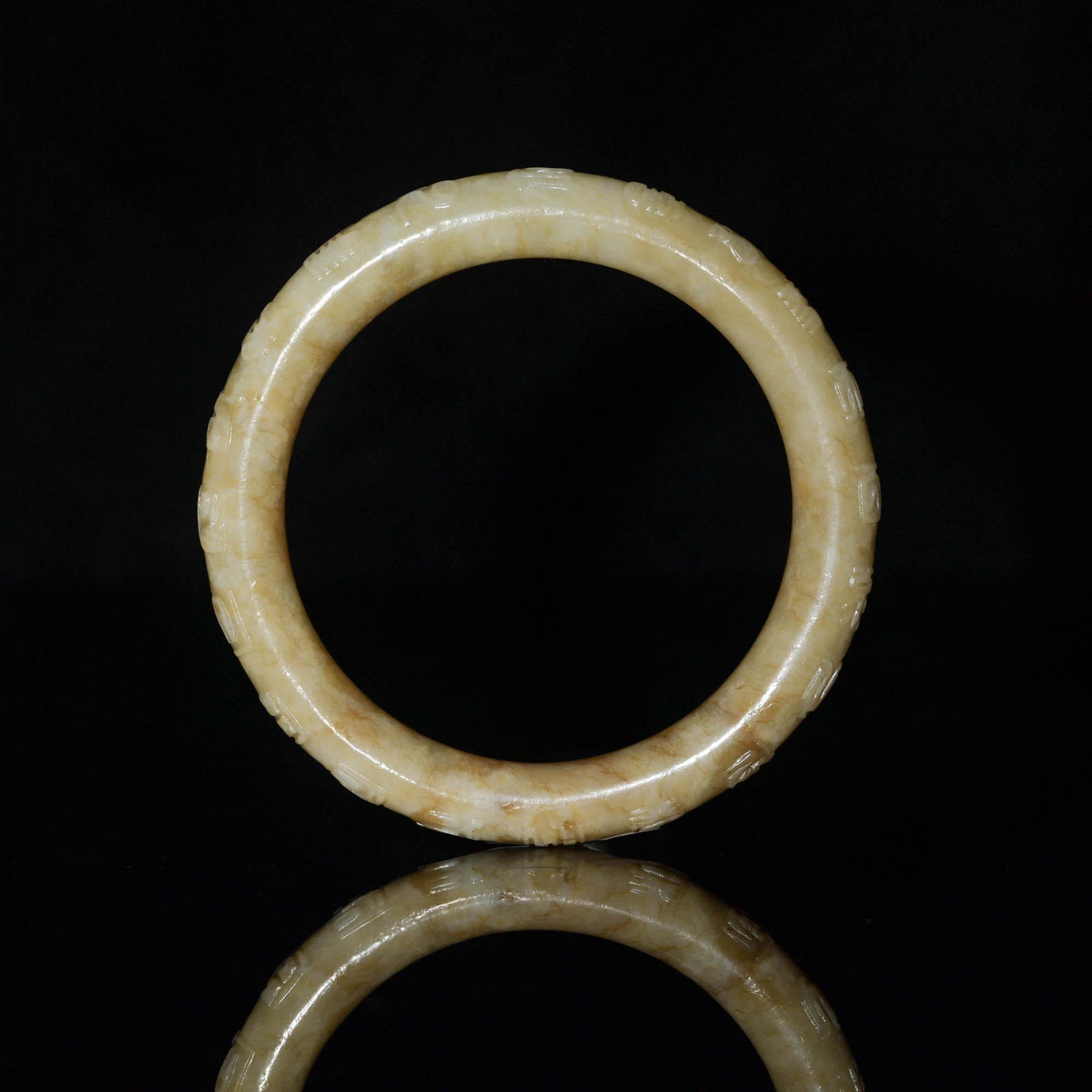 A Chinese jade bangle, Ming dynasty or earlier (1 of 3)