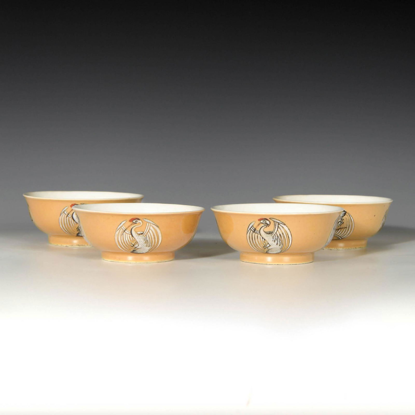 A group of four Chinese yellow ground crane cups, 19th century (1 of 14)