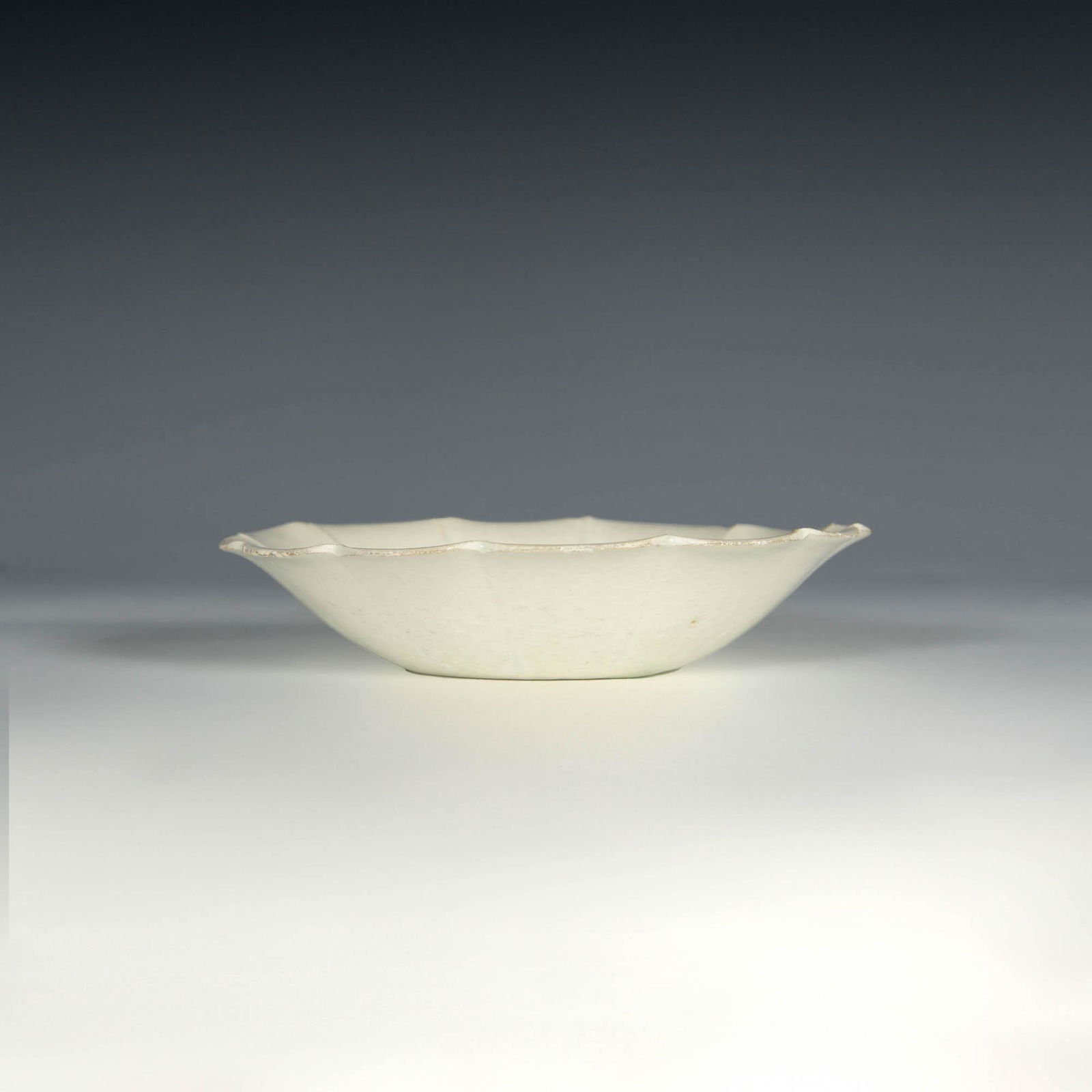 A Chinese Ying Qing lobed washer, Song dynasty (1 of 4)