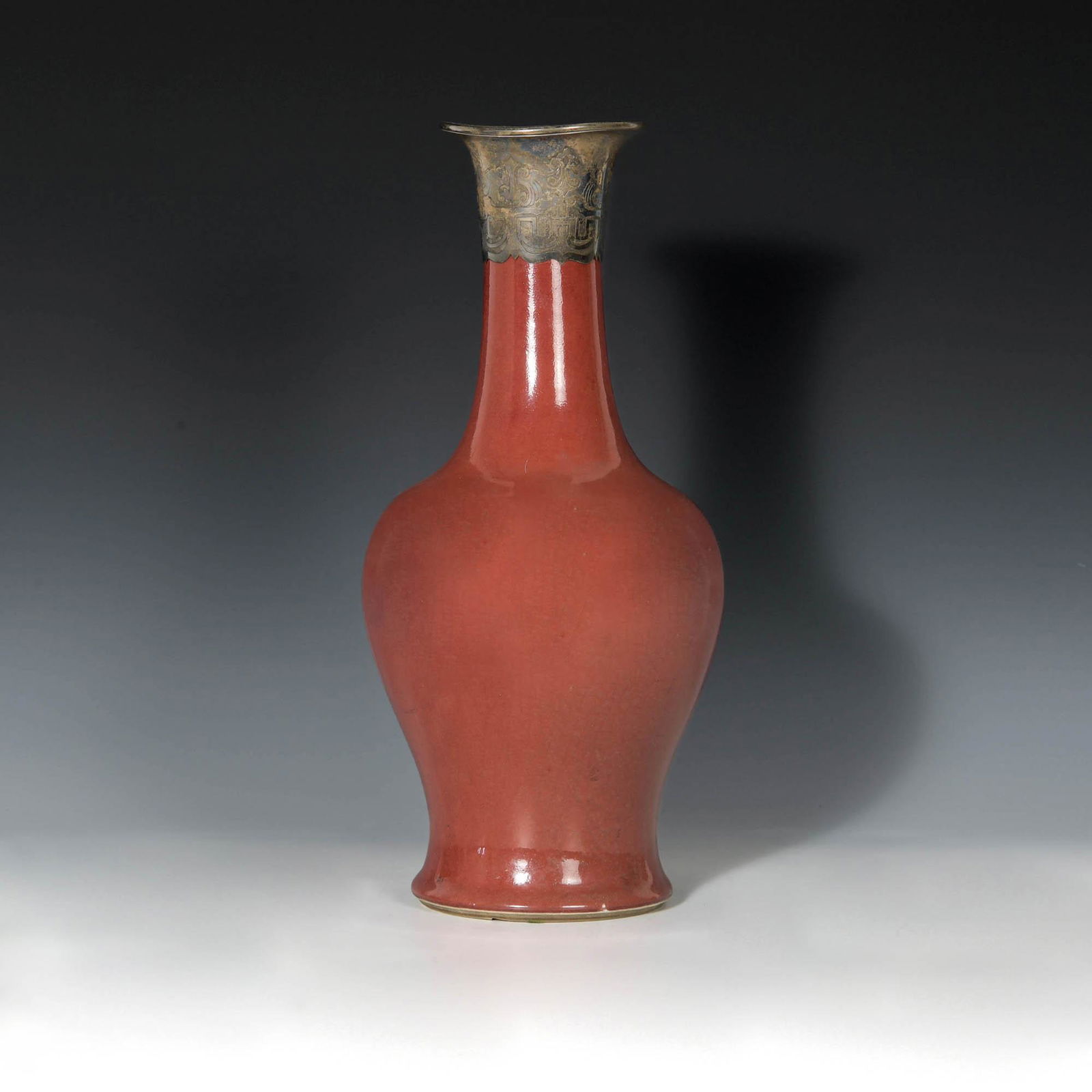 A red-glaze langyao vase with silver top, Kangxi period (1 of 5)