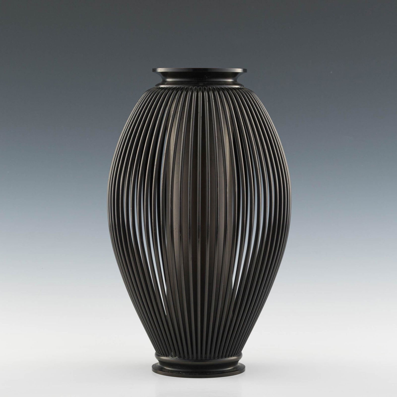 A Japanese Art Deco two-part bronze ikebana vase (1 of 7)
