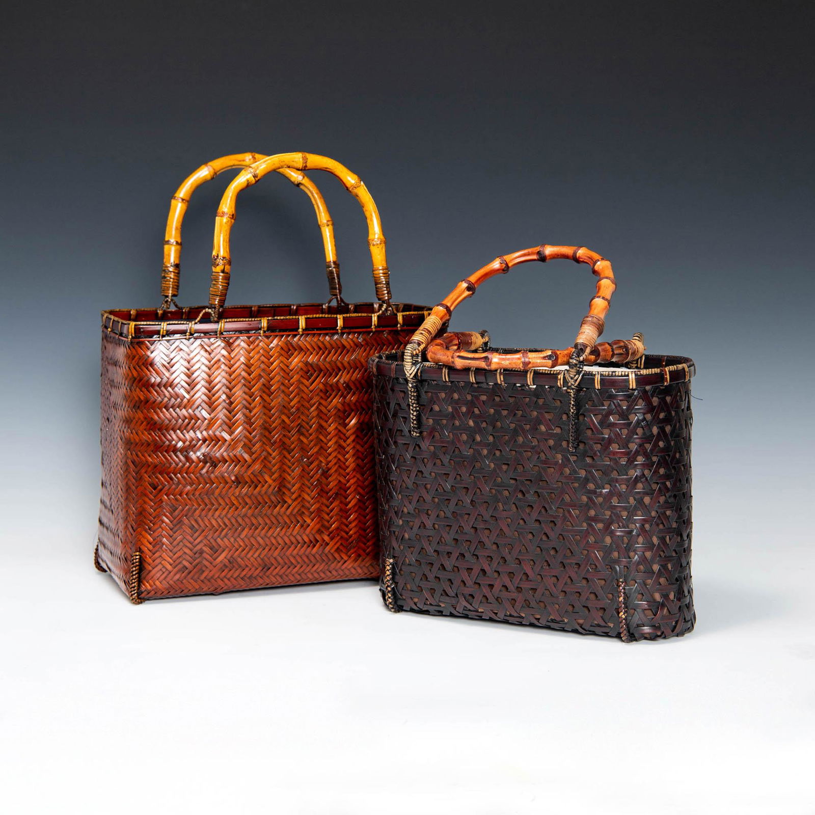 Two Japanese ikebana-basket-style handbags: Two Japanese ikebana-basket-style handbags 20th century Both with drawstring closures and cloth-lined interior. H: 9 1/8, W: 11 1/2, D: 5 in. (largest) H: 23.18, W: 29.21, D: 12.7 cm. (largest) Proven