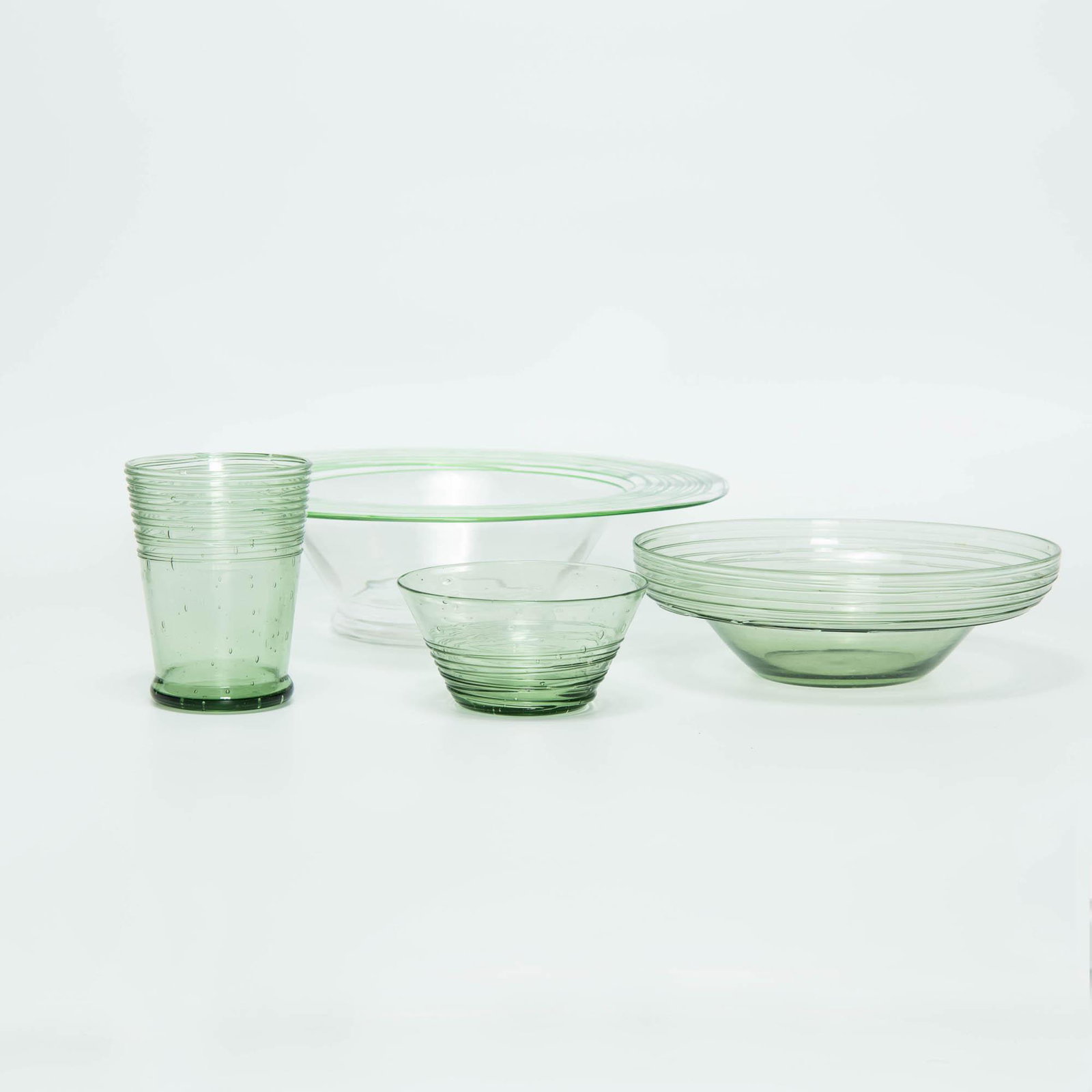 A collection of Steuben hand-blown threaded air bubble glassware in Spanish Green, 20th century (1 of 7)