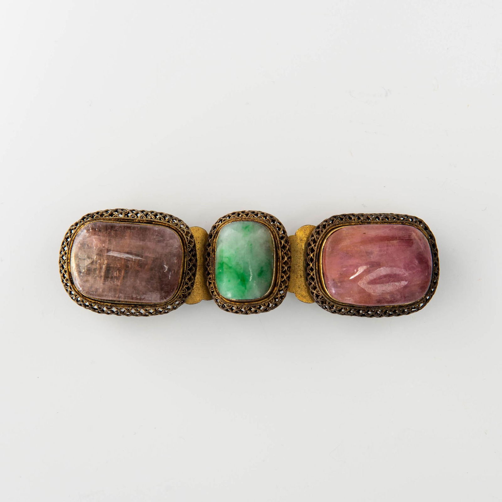 A Chinese gilt-bronze belt buckle with precious stone inlay, 19th century (1 of 3)