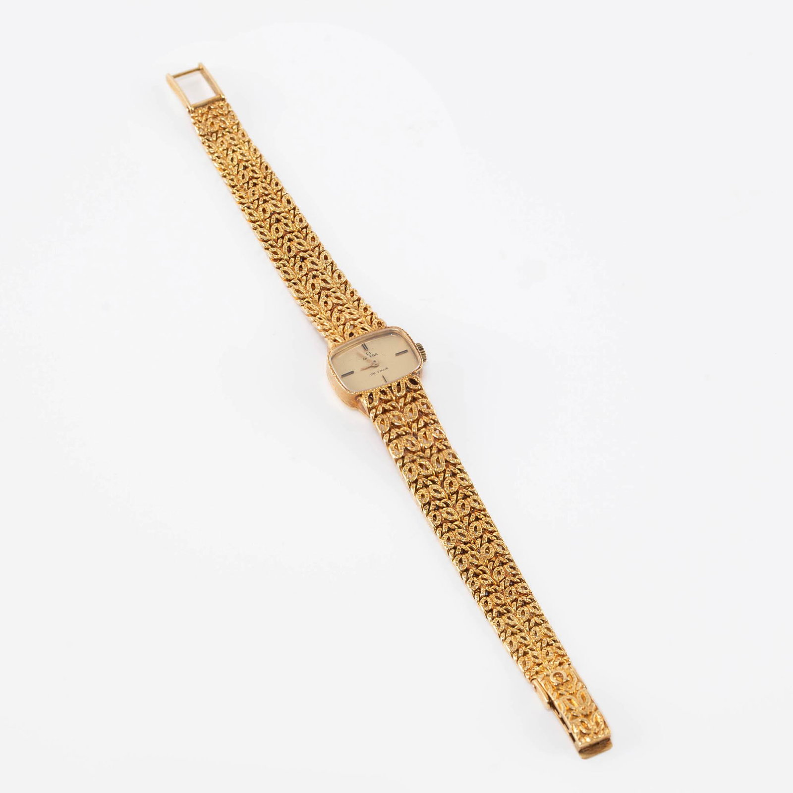 An eighteen karat gold wristwatch, Omega (1 of 4)
