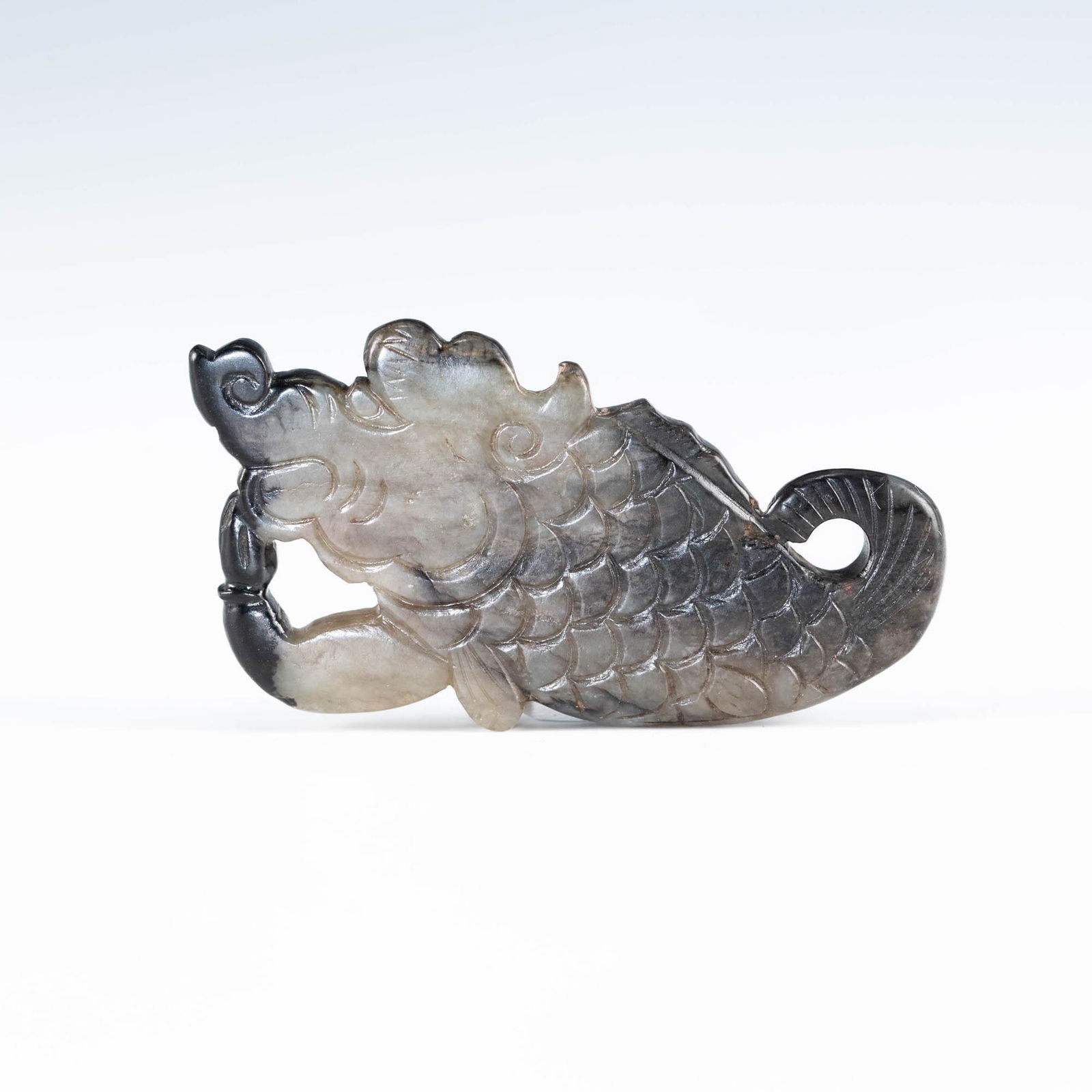 A Chinese carved black jade fish, 18th century (1 of 3)