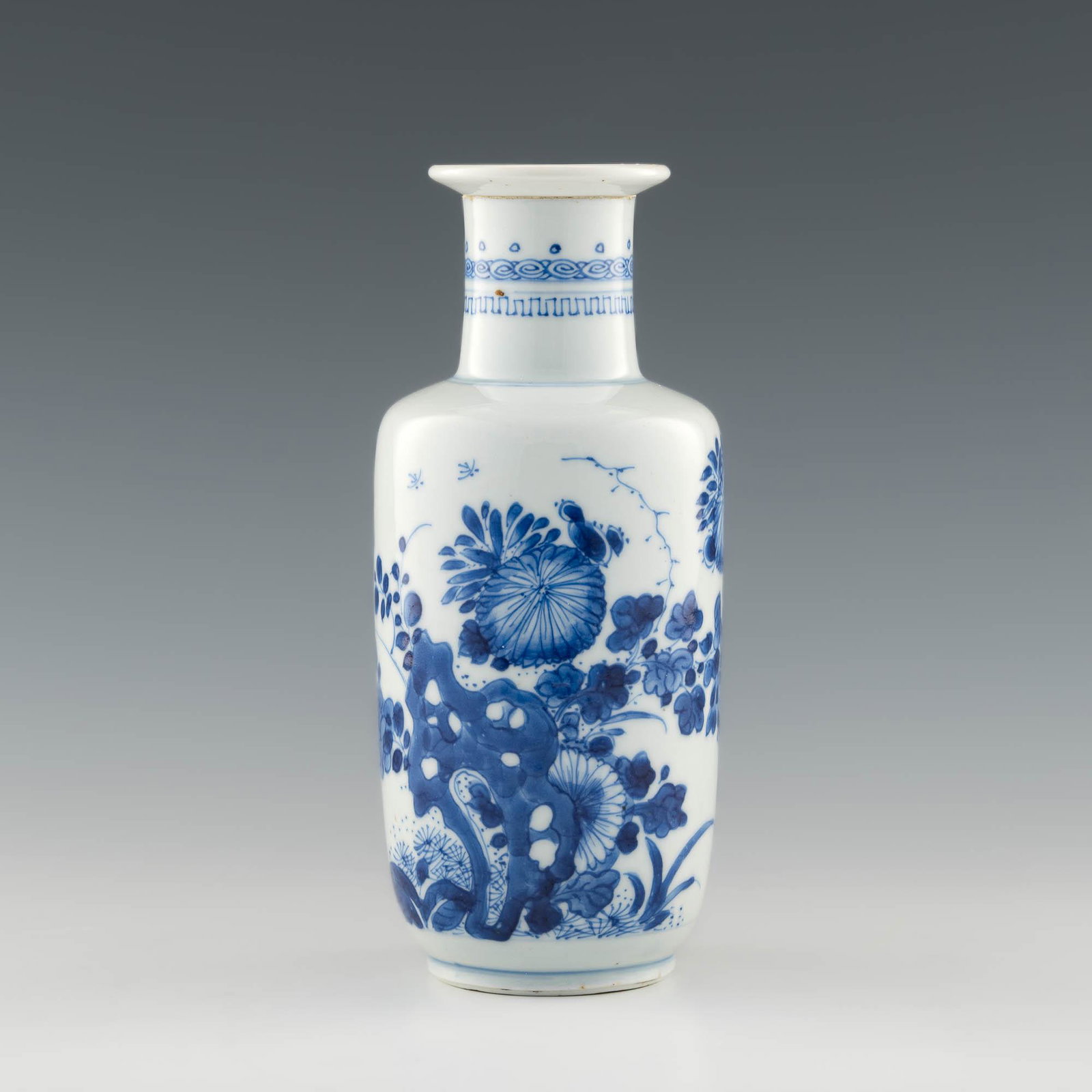A Chinese blue and white rouleau vase, Kangxi period: A Chinese blue and white rouleau vase Kangxi period With geometric patterned bands to the neck; insects, floral, and vegetal motifs to the body. H: 7 7/8, Dia: 3 1/2 in. (H: 20, Dia: 8.89 cm.) Provena