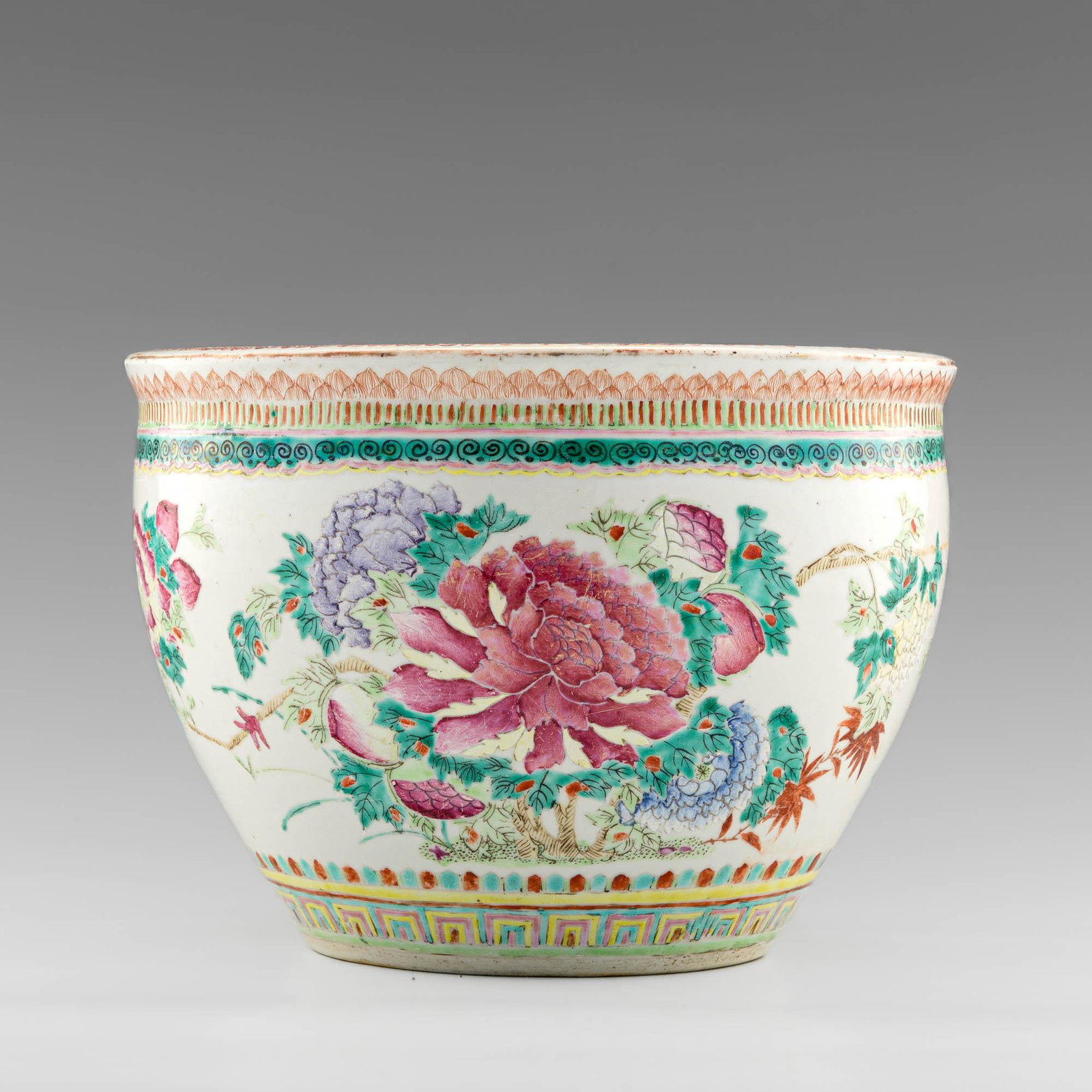 A Chinese famille rose jar, 19th century: A Chinese famille rose jar 19th century With vibrant and detailed floral motifs to exterior and butterfly to one side. Underwater design with fish to interior. Previous collectors sticker to underside