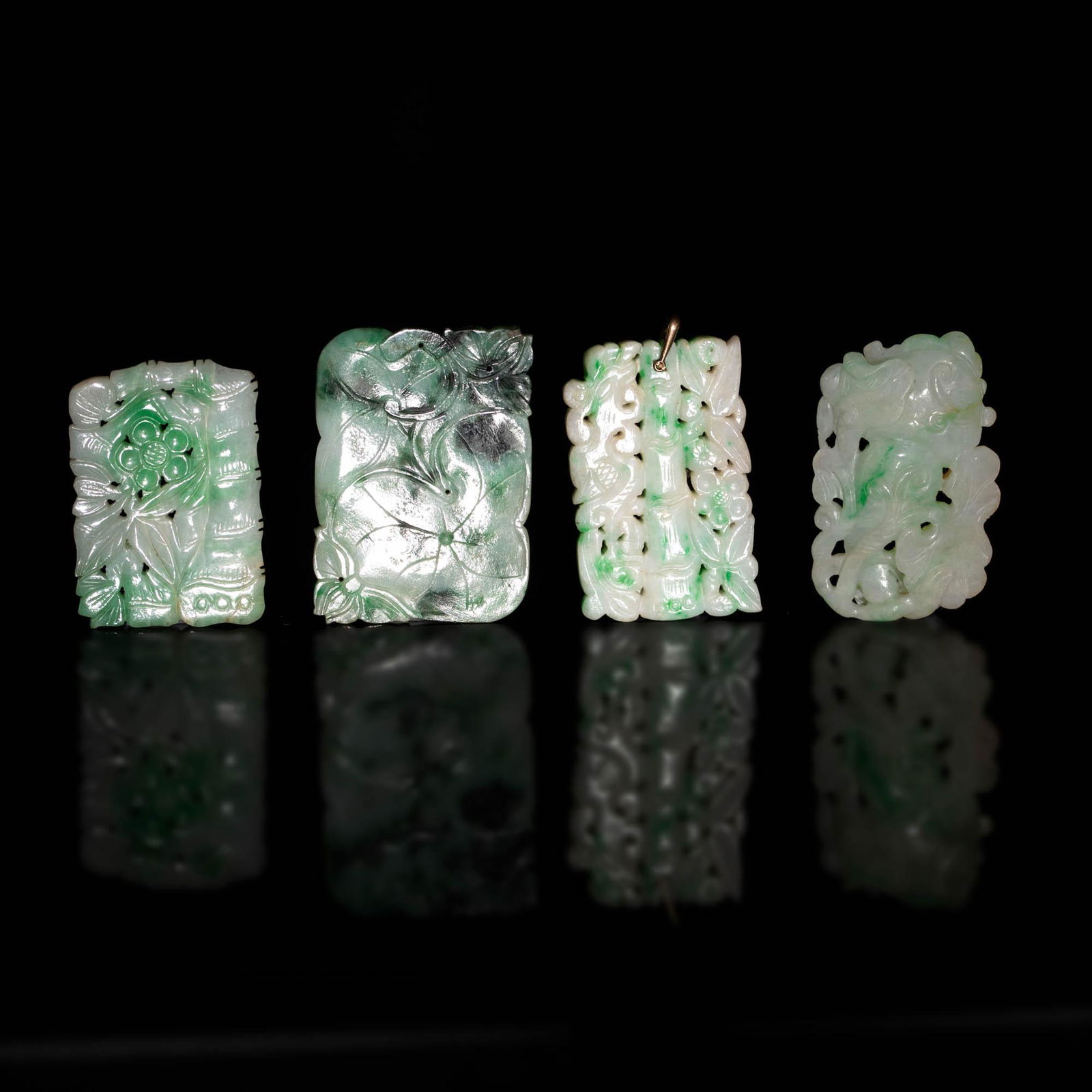 A group of four Chinese jadeite flower plaques, 19th century (1 of 3)