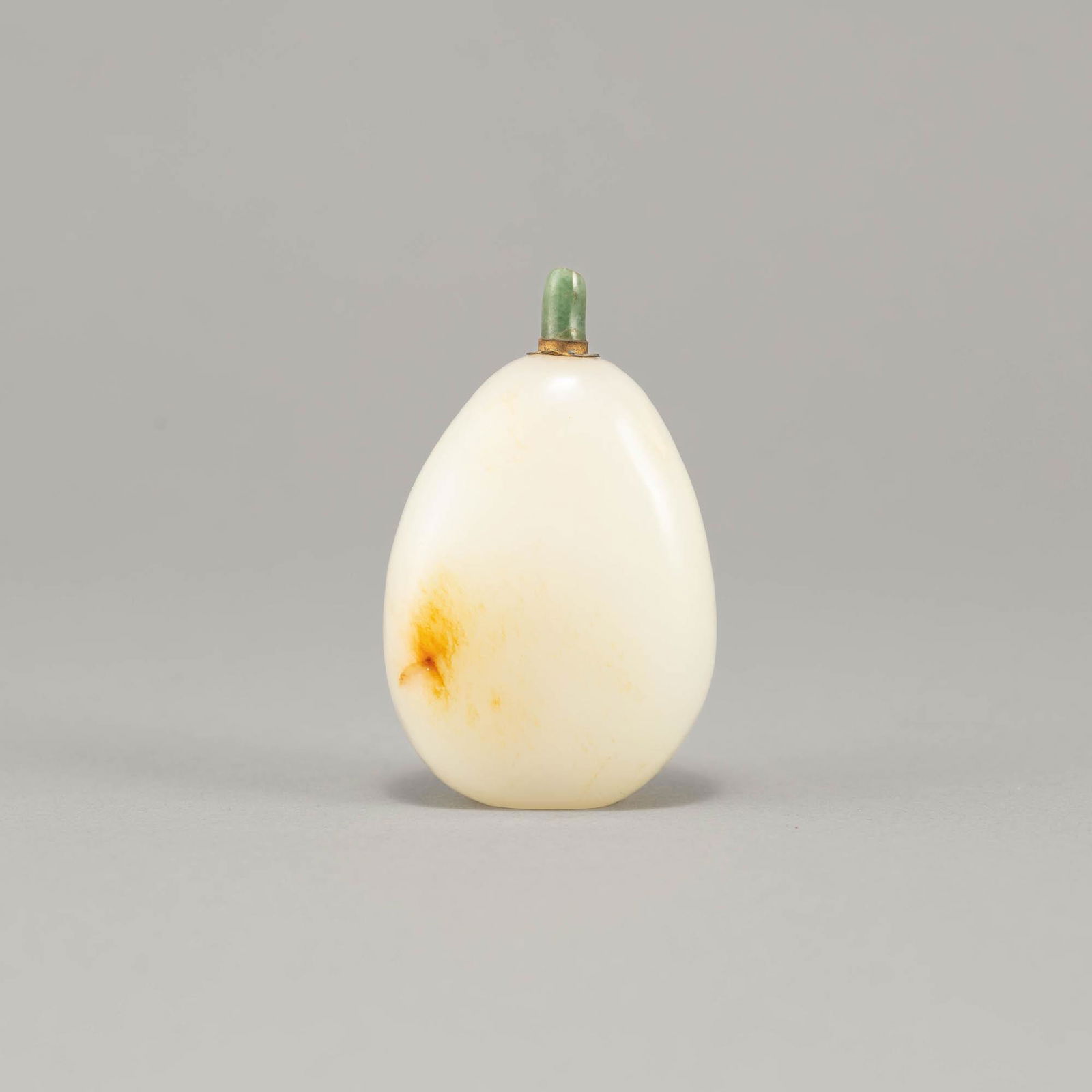 A Chinese white jade snuff bottle with brown skin, 18th century (1 of 8)