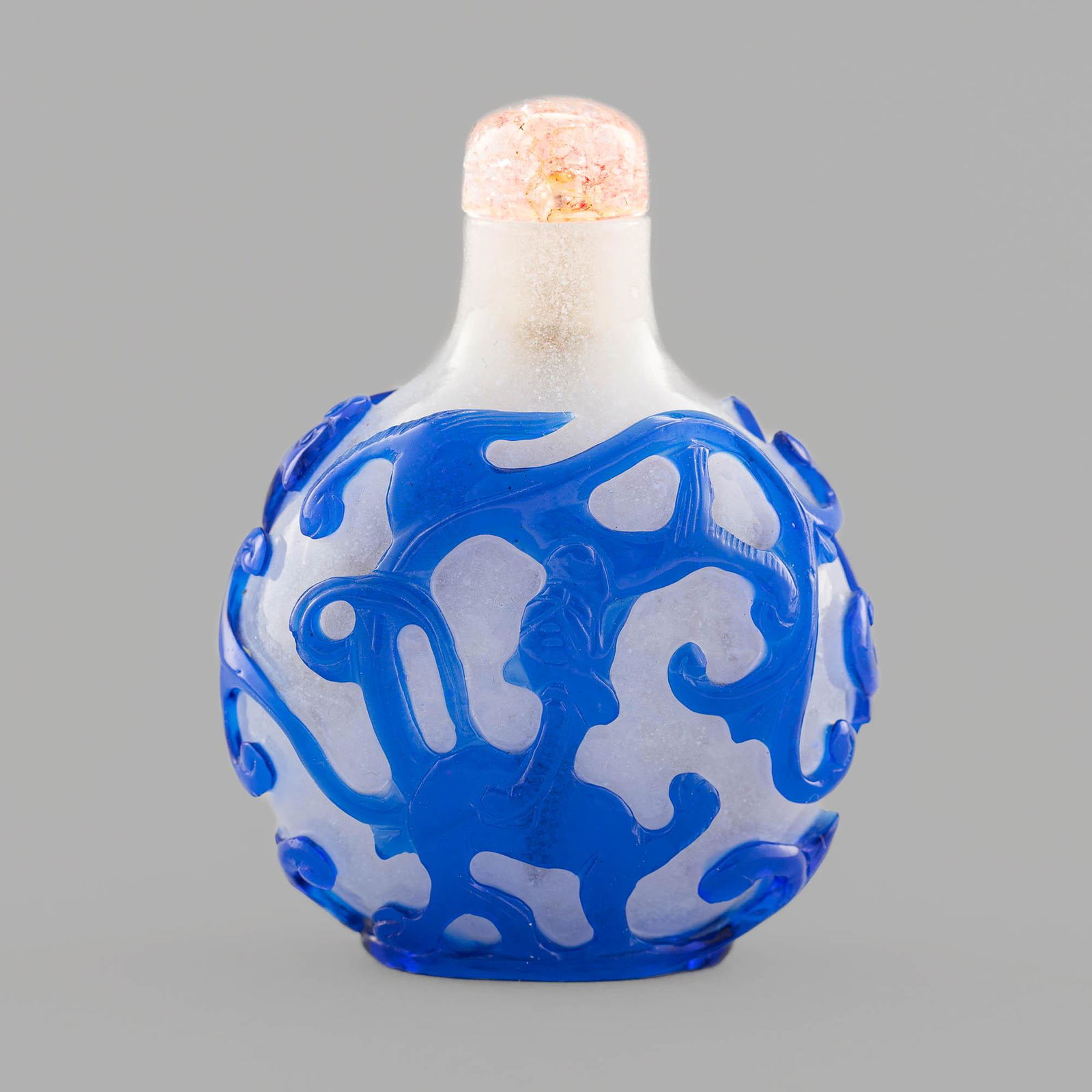A Chinese blue-overlay white Peking glass snuff bottle, 18th/19th century (1 of 9)