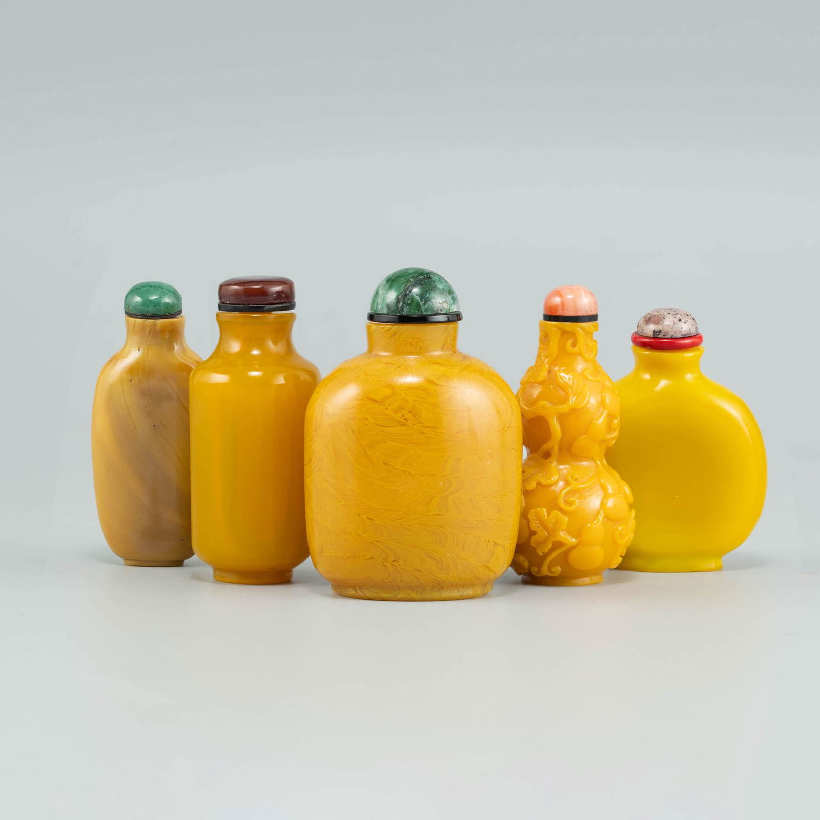 Five Chinese yellow glass snuff bottles, 18th/19th century (1 of 11)