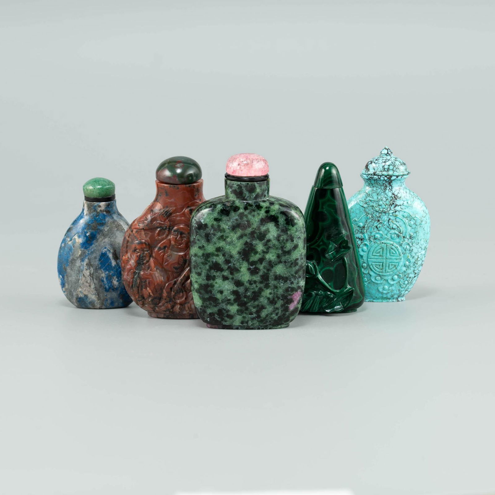 Five assorted Chinese carved stone snuff bottles, 19th/early 20th century (1 of 7)