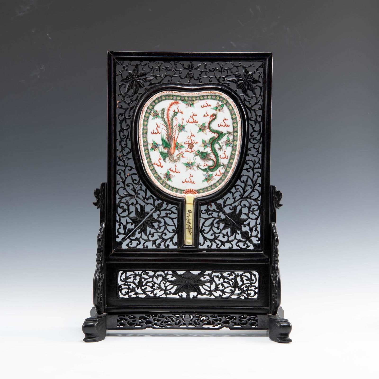 A Chinese wucai fan-form dragon and phoenix plaque table screen, 19th century (1 of 5)