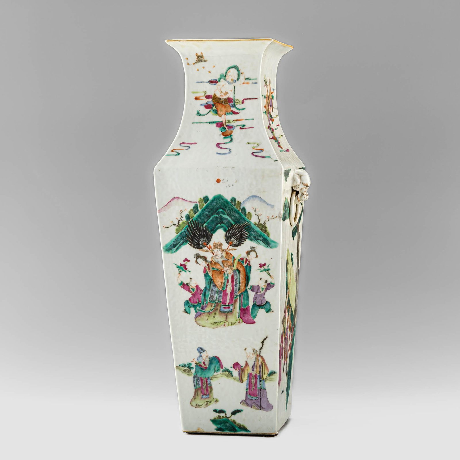 A Chinese famille rose square vase, late 19th century: A Chinese famille rose square vase late 19th century Featuring scenes of armored and courtly figures in landscape to body and neck; with beast-biting-ring handles either side. With six-character mark 