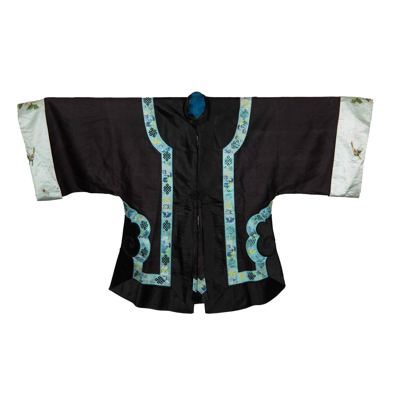 A Chinese black-ground lady's robe, 19th century: A Chinese black-ground lady's robe 19th century With turquoise-ground trim decorated with floral motifs and endless knots. H: 37 3/8, W: 59 1/8 in. H: 94.93, W: 150.18 cm. Provenance: Private collecti