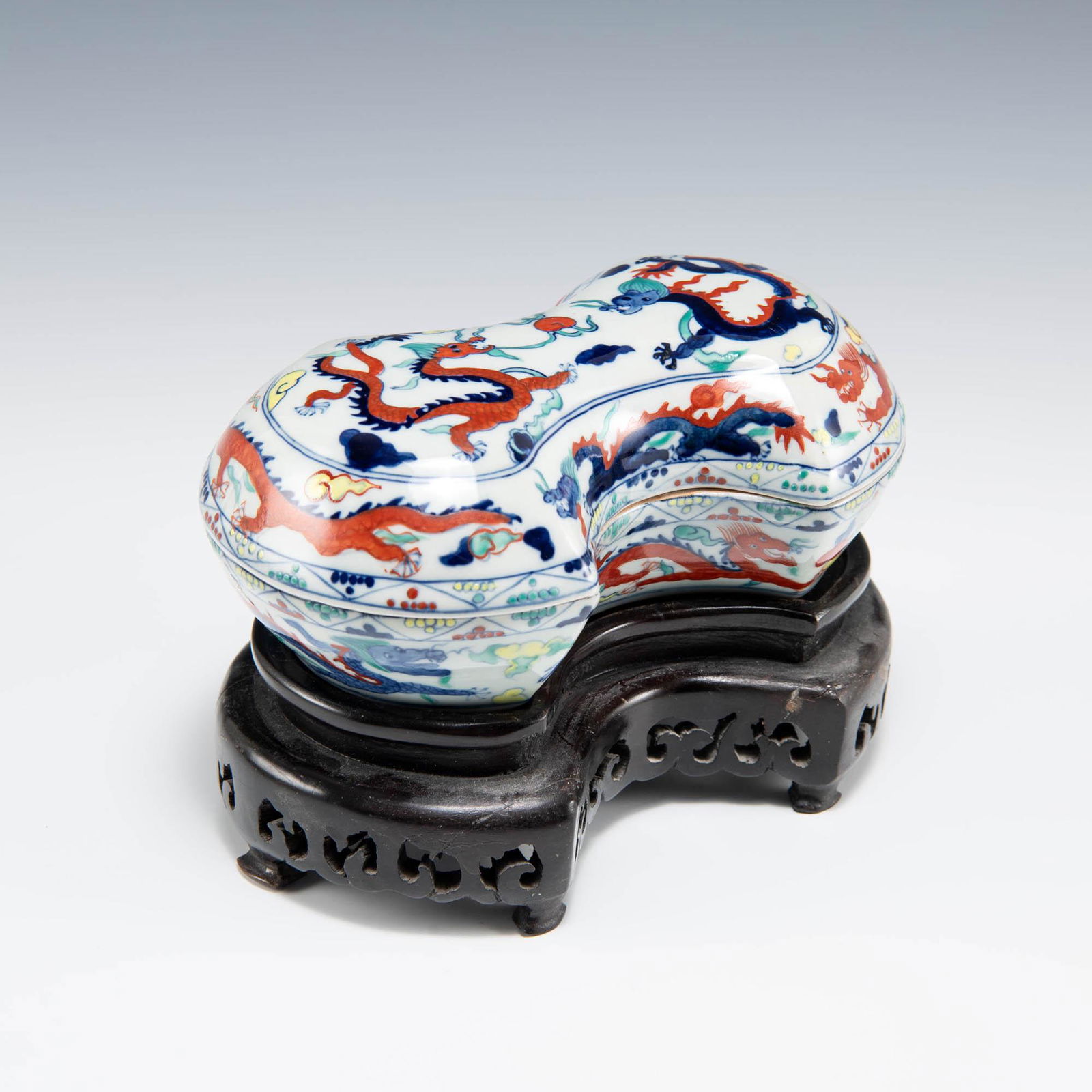 A Chinese wucai arched box with dragons and wood stand (1 of 9)