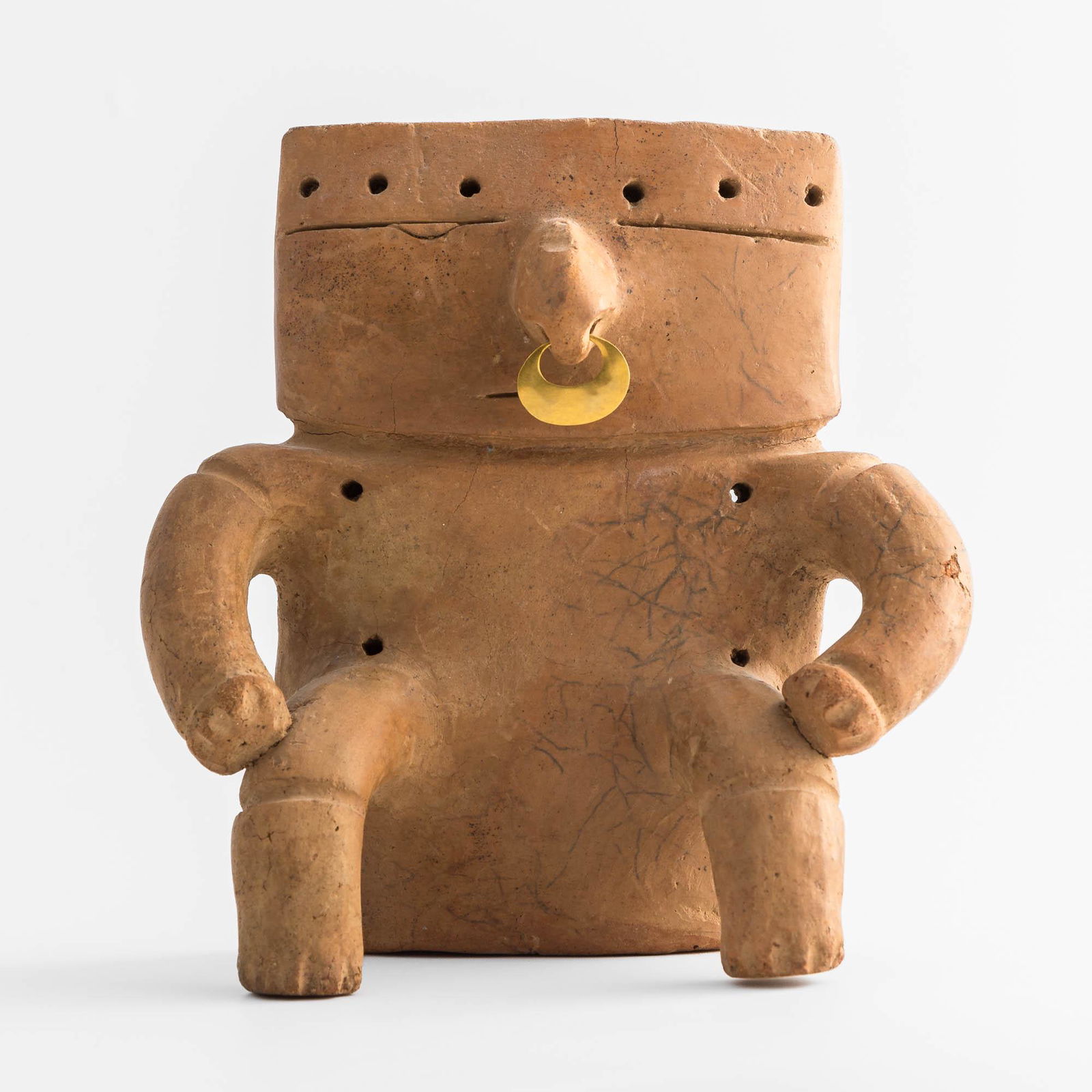 A Quimbaya seated slab figure, Quimbaya culture (c. 200 BC-1550 CE) (1 of 18)