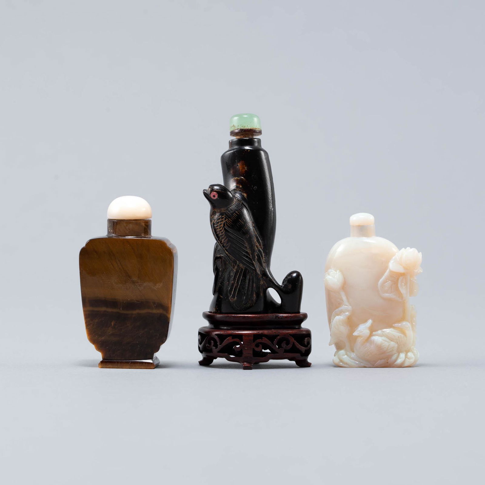 Three Chinese carved precious stone snuff bottles, 19th/20th century (1 of 7)