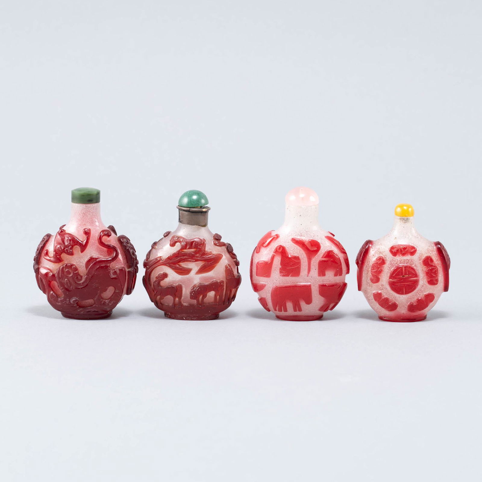 Four Chinese red-overlay glass snuff bottles, 19th century (1 of 6)