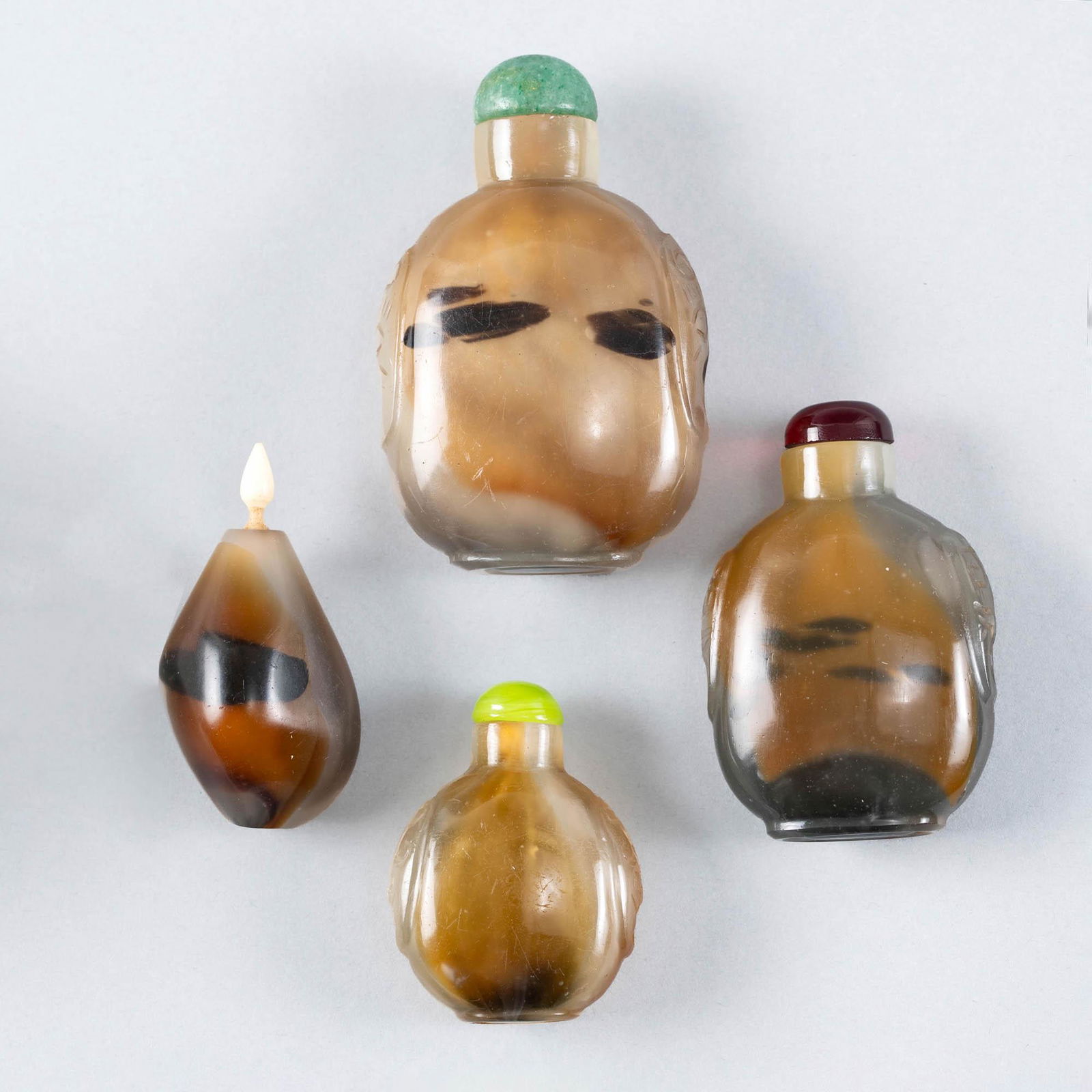 Four Chinese imitation-agate glass snuff bottles, 19th century (1 of 9)