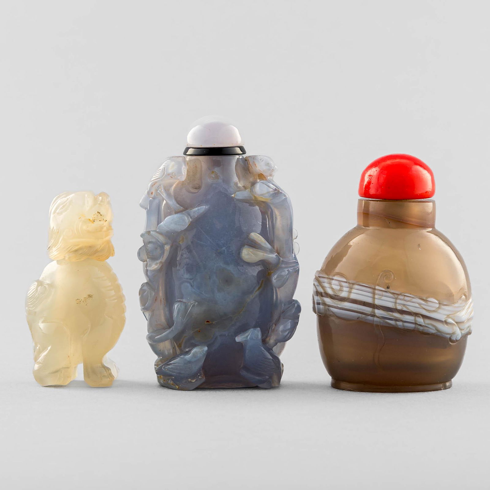 Three assorted Chinese stone snuff bottles, 19th/20th century (1 of 11)