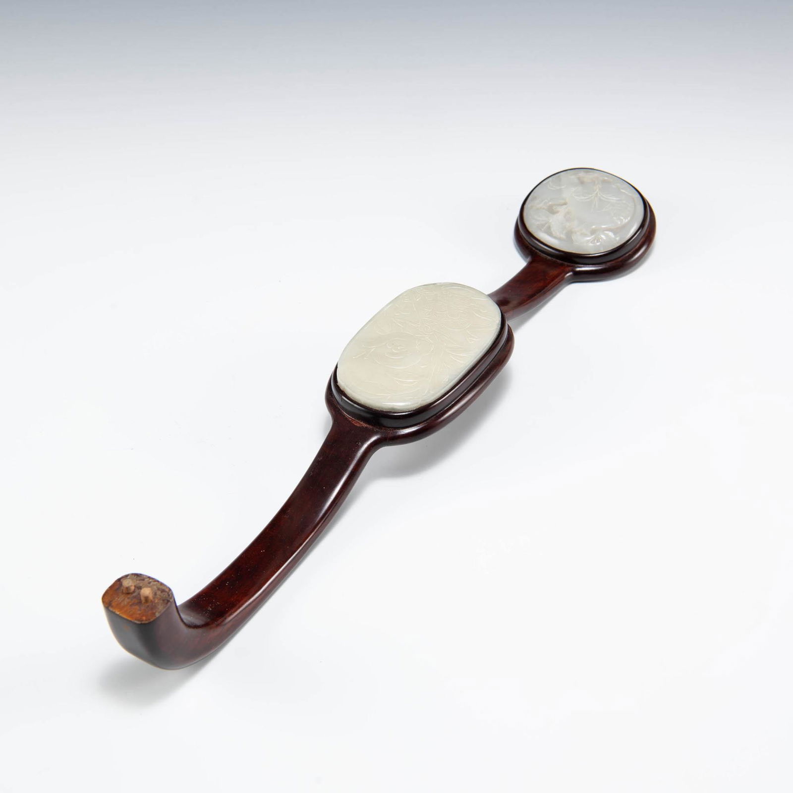 A Chinese hardwood ruyi with jade inlay, 18th/19th century (1 of 7)