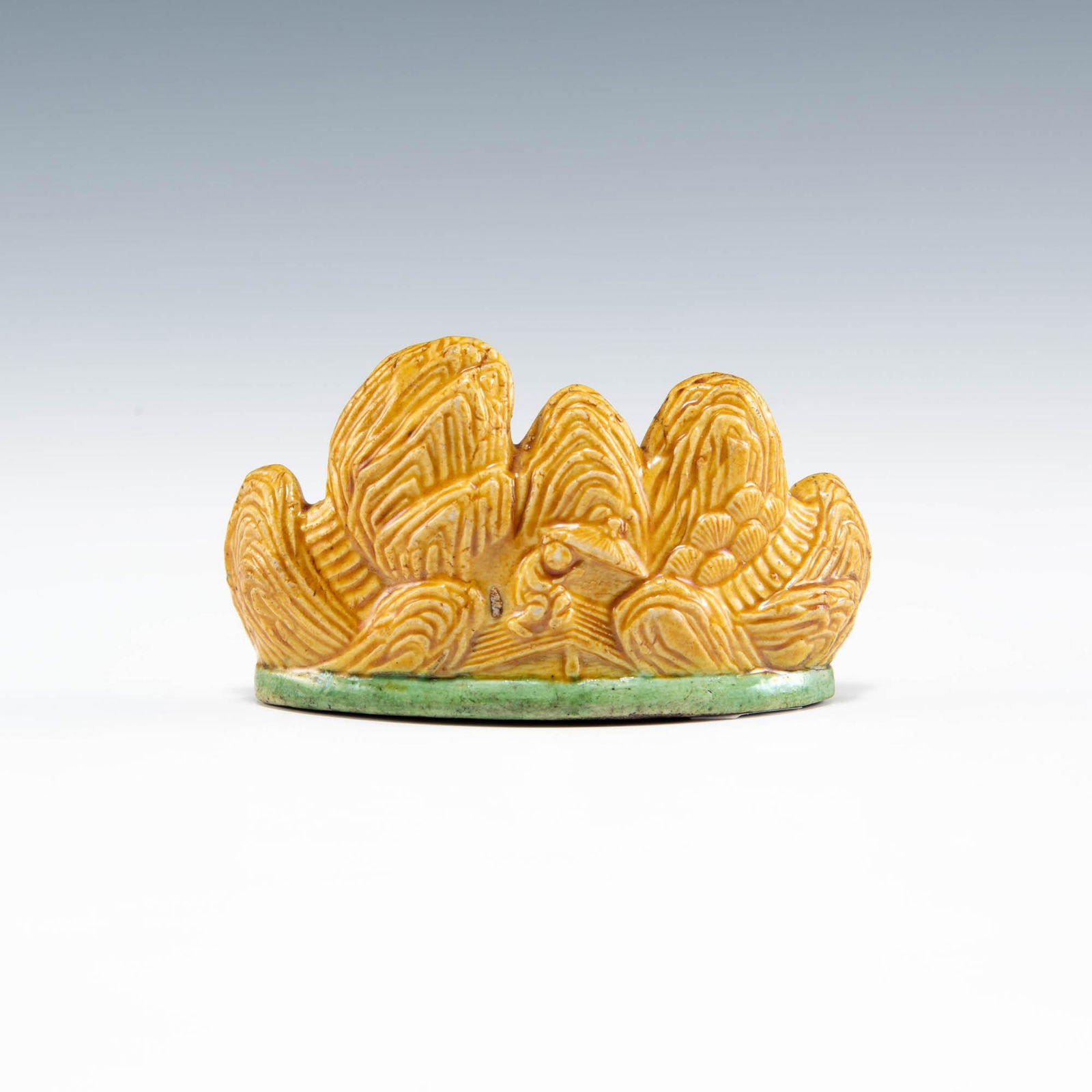 A Chinese yellow-glazed porcelain brush rest, 19th century (1 of 6)